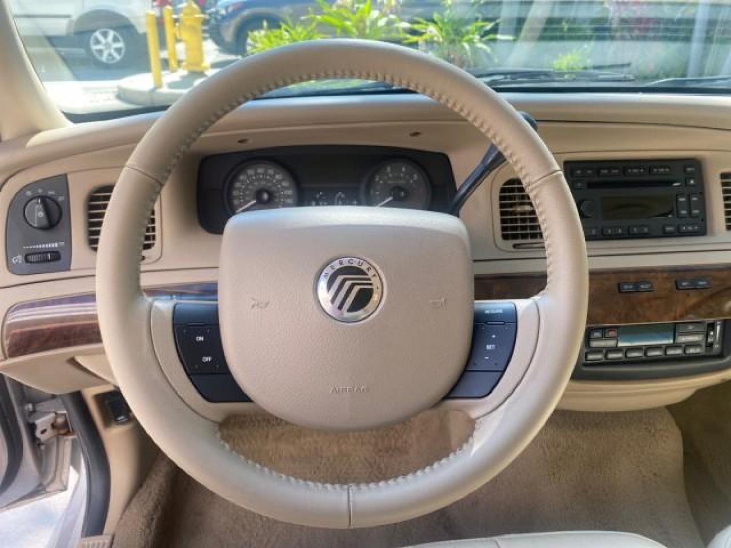 2009 Silver Birch Metallic /Light camel Mercury Grand Marquis LS LOW MILES 54,807 (2MEHM75V99X) with an 4.6L OHC SEFI FFV V8 Engine engine, Automatic transmission, located at 4701 North Dixie Hwy, Pompano Beach, FL, 33064, (954) 422-2889, 26.240938, -80.123474 - OUR WEBPAGE FLORIDACARS1.COM HAS OVER 100 PHOTOS AND FREE CARFAX LINK 2009 Mercury Grand Marquis LS Sedan 4 DR 4.6L V8 F SOHC 16V Flex Fuel 25 MPG Rear Wheel Drive Features ABS Brakes Air Conditioning Alloy Wheels AM/FM Stereo Automatic Transmission CD Audio Cruise Control Flex Fuel Vehicle Leather- Photo#47