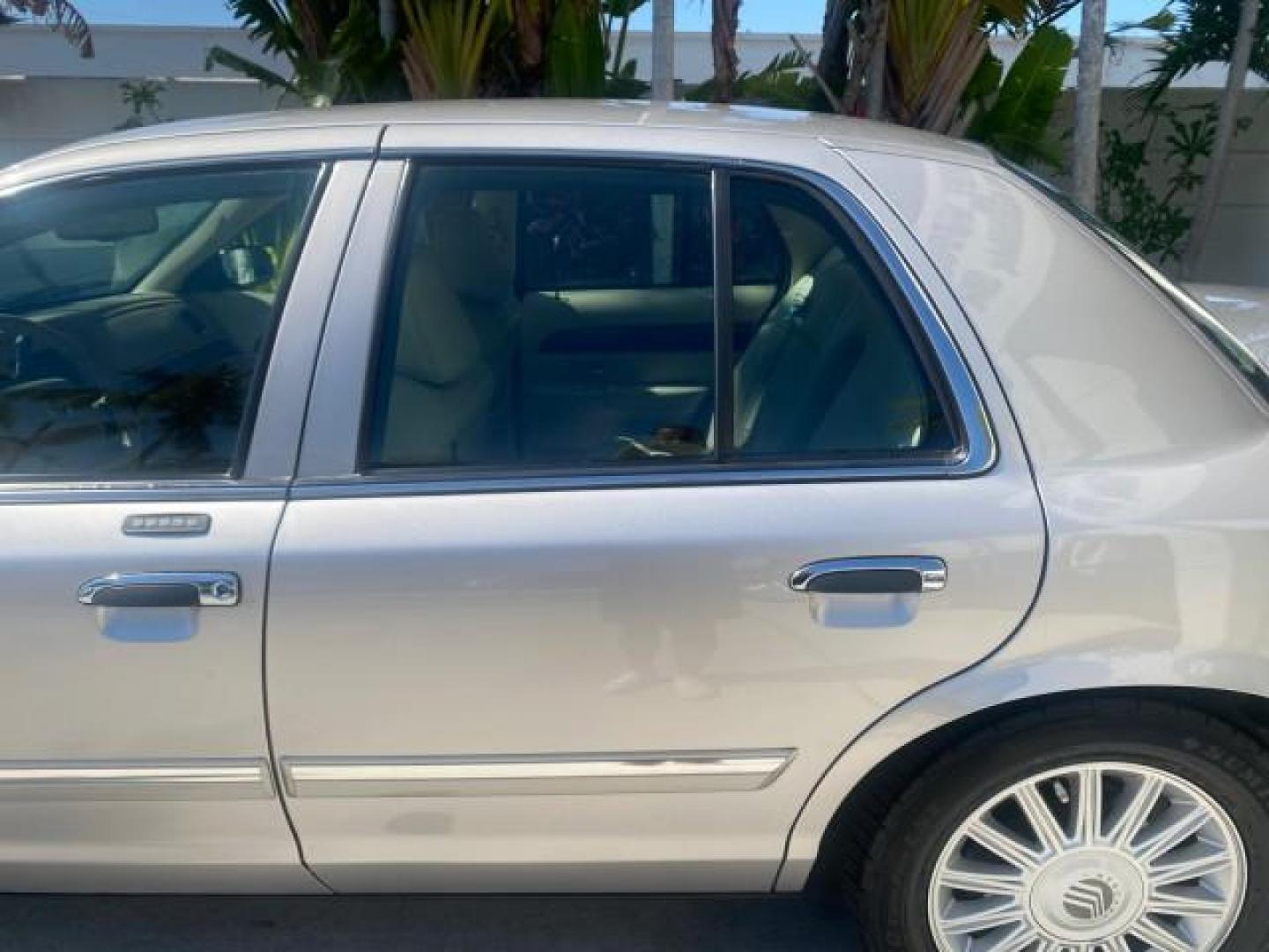 2009 Silver Birch Metallic /Light camel Mercury Grand Marquis LS LOW MILES 54,807 (2MEHM75V99X) with an 4.6L OHC SEFI FFV V8 Engine engine, Automatic transmission, located at 4701 North Dixie Hwy, Pompano Beach, FL, 33064, (954) 422-2889, 26.240938, -80.123474 - OUR WEBPAGE FLORIDACARS1.COM HAS OVER 100 PHOTOS AND FREE CARFAX LINK 2009 Mercury Grand Marquis LS Sedan 4 DR 4.6L V8 F SOHC 16V Flex Fuel 25 MPG Rear Wheel Drive Features ABS Brakes Air Conditioning Alloy Wheels AM/FM Stereo Automatic Transmission CD Audio Cruise Control Flex Fuel Vehicle Leather- Photo#66