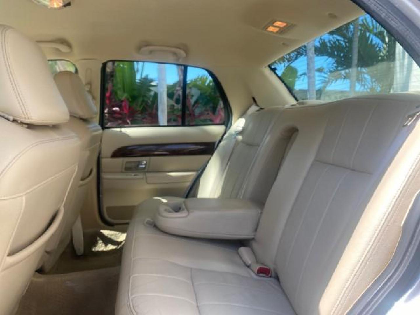 2009 Silver Birch Metallic /Light camel Mercury Grand Marquis LS LOW MILES 54,807 (2MEHM75V99X) with an 4.6L OHC SEFI FFV V8 Engine engine, Automatic transmission, located at 4701 North Dixie Hwy, Pompano Beach, FL, 33064, (954) 422-2889, 26.240938, -80.123474 - OUR WEBPAGE FLORIDACARS1.COM HAS OVER 100 PHOTOS AND FREE CARFAX LINK 2009 Mercury Grand Marquis LS Sedan 4 DR 4.6L V8 F SOHC 16V Flex Fuel 25 MPG Rear Wheel Drive Features ABS Brakes Air Conditioning Alloy Wheels AM/FM Stereo Automatic Transmission CD Audio Cruise Control Flex Fuel Vehicle Leather- Photo#69