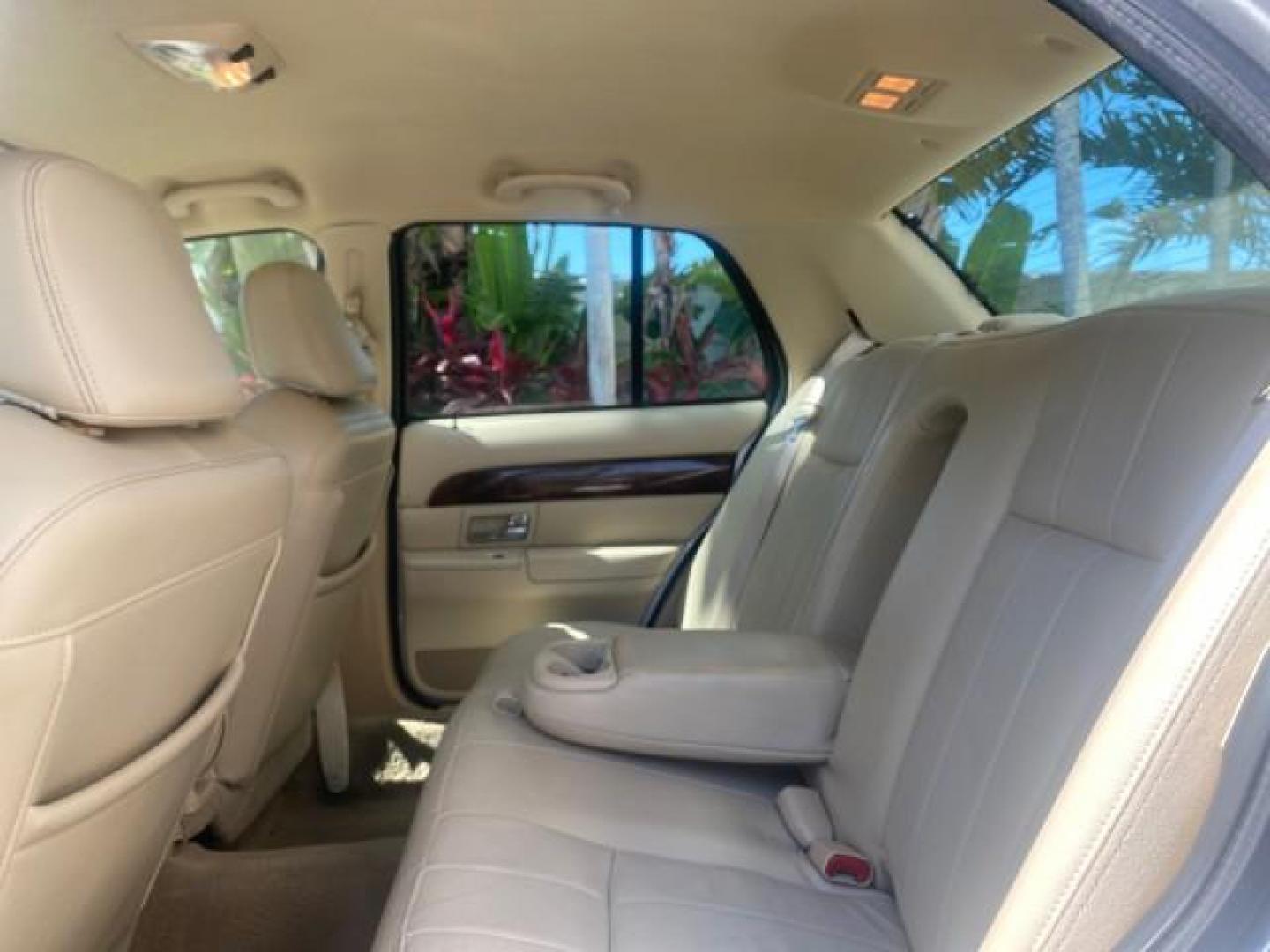 2009 Silver Birch Metallic /Light camel Mercury Grand Marquis LS LOW MILES 54,807 (2MEHM75V99X) with an 4.6L OHC SEFI FFV V8 Engine engine, Automatic transmission, located at 4701 North Dixie Hwy, Pompano Beach, FL, 33064, (954) 422-2889, 26.240938, -80.123474 - OUR WEBPAGE FLORIDACARS1.COM HAS OVER 100 PHOTOS AND FREE CARFAX LINK 2009 Mercury Grand Marquis LS Sedan 4 DR 4.6L V8 F SOHC 16V Flex Fuel 25 MPG Rear Wheel Drive Features ABS Brakes Air Conditioning Alloy Wheels AM/FM Stereo Automatic Transmission CD Audio Cruise Control Flex Fuel Vehicle Leather- Photo#70