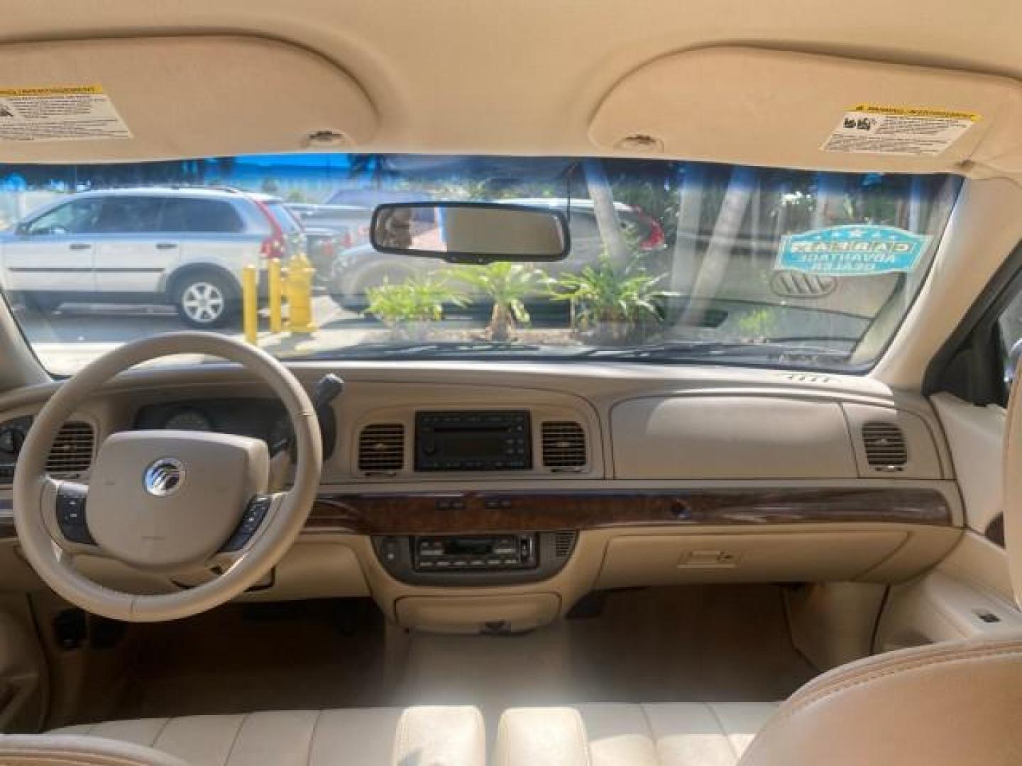 2009 Silver Birch Metallic /Light camel Mercury Grand Marquis LS LOW MILES 54,807 (2MEHM75V99X) with an 4.6L OHC SEFI FFV V8 Engine engine, Automatic transmission, located at 4701 North Dixie Hwy, Pompano Beach, FL, 33064, (954) 422-2889, 26.240938, -80.123474 - OUR WEBPAGE FLORIDACARS1.COM HAS OVER 100 PHOTOS AND FREE CARFAX LINK 2009 Mercury Grand Marquis LS Sedan 4 DR 4.6L V8 F SOHC 16V Flex Fuel 25 MPG Rear Wheel Drive Features ABS Brakes Air Conditioning Alloy Wheels AM/FM Stereo Automatic Transmission CD Audio Cruise Control Flex Fuel Vehicle Leather- Photo#75