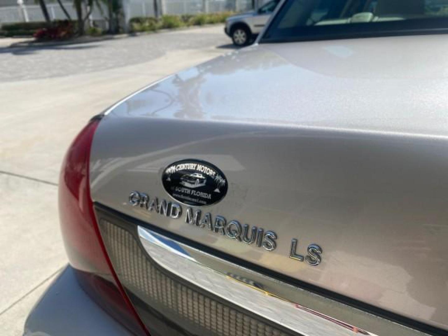 2009 Silver Birch Metallic /Light camel Mercury Grand Marquis LS LOW MILES 54,807 (2MEHM75V99X) with an 4.6L OHC SEFI FFV V8 Engine engine, Automatic transmission, located at 4701 North Dixie Hwy, Pompano Beach, FL, 33064, (954) 422-2889, 26.240938, -80.123474 - OUR WEBPAGE FLORIDACARS1.COM HAS OVER 100 PHOTOS AND FREE CARFAX LINK 2009 Mercury Grand Marquis LS Sedan 4 DR 4.6L V8 F SOHC 16V Flex Fuel 25 MPG Rear Wheel Drive Features ABS Brakes Air Conditioning Alloy Wheels AM/FM Stereo Automatic Transmission CD Audio Cruise Control Flex Fuel Vehicle Leather- Photo#82