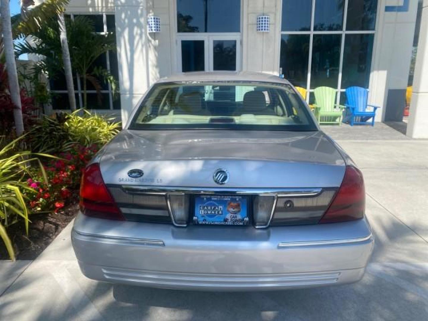 2009 Silver Birch Metallic /Light camel Mercury Grand Marquis LS LOW MILES 54,807 (2MEHM75V99X) with an 4.6L OHC SEFI FFV V8 Engine engine, Automatic transmission, located at 4701 North Dixie Hwy, Pompano Beach, FL, 33064, (954) 422-2889, 26.240938, -80.123474 - OUR WEBPAGE FLORIDACARS1.COM HAS OVER 100 PHOTOS AND FREE CARFAX LINK 2009 Mercury Grand Marquis LS Sedan 4 DR 4.6L V8 F SOHC 16V Flex Fuel 25 MPG Rear Wheel Drive Features ABS Brakes Air Conditioning Alloy Wheels AM/FM Stereo Automatic Transmission CD Audio Cruise Control Flex Fuel Vehicle Leather- Photo#88