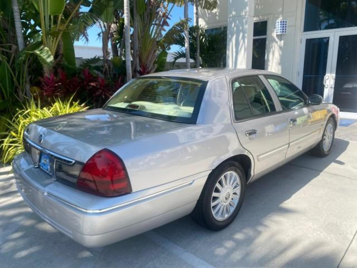 2009 Silver Birch Metallic /Light camel Mercury Grand Marquis LS LOW MILES 54,807 (2MEHM75V99X) with an 4.6L OHC SEFI FFV V8 Engine engine, Automatic transmission, located at 4701 North Dixie Hwy, Pompano Beach, FL, 33064, (954) 422-2889, 26.240938, -80.123474 - OUR WEBPAGE FLORIDACARS1.COM HAS OVER 100 PHOTOS AND FREE CARFAX LINK 2009 Mercury Grand Marquis LS Sedan 4 DR 4.6L V8 F SOHC 16V Flex Fuel 25 MPG Rear Wheel Drive Features ABS Brakes Air Conditioning Alloy Wheels AM/FM Stereo Automatic Transmission CD Audio Cruise Control Flex Fuel Vehicle Leather- Photo#90
