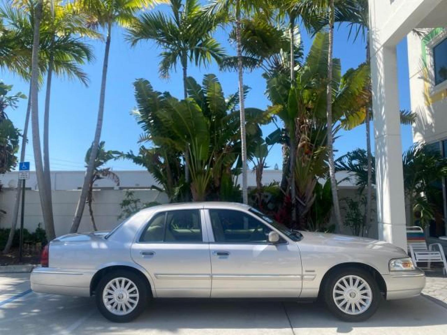 2009 Silver Birch Metallic /Light camel Mercury Grand Marquis LS LOW MILES 54,807 (2MEHM75V99X) with an 4.6L OHC SEFI FFV V8 Engine engine, Automatic transmission, located at 4701 North Dixie Hwy, Pompano Beach, FL, 33064, (954) 422-2889, 26.240938, -80.123474 - OUR WEBPAGE FLORIDACARS1.COM HAS OVER 100 PHOTOS AND FREE CARFAX LINK 2009 Mercury Grand Marquis LS Sedan 4 DR 4.6L V8 F SOHC 16V Flex Fuel 25 MPG Rear Wheel Drive Features ABS Brakes Air Conditioning Alloy Wheels AM/FM Stereo Automatic Transmission CD Audio Cruise Control Flex Fuel Vehicle Leather- Photo#91
