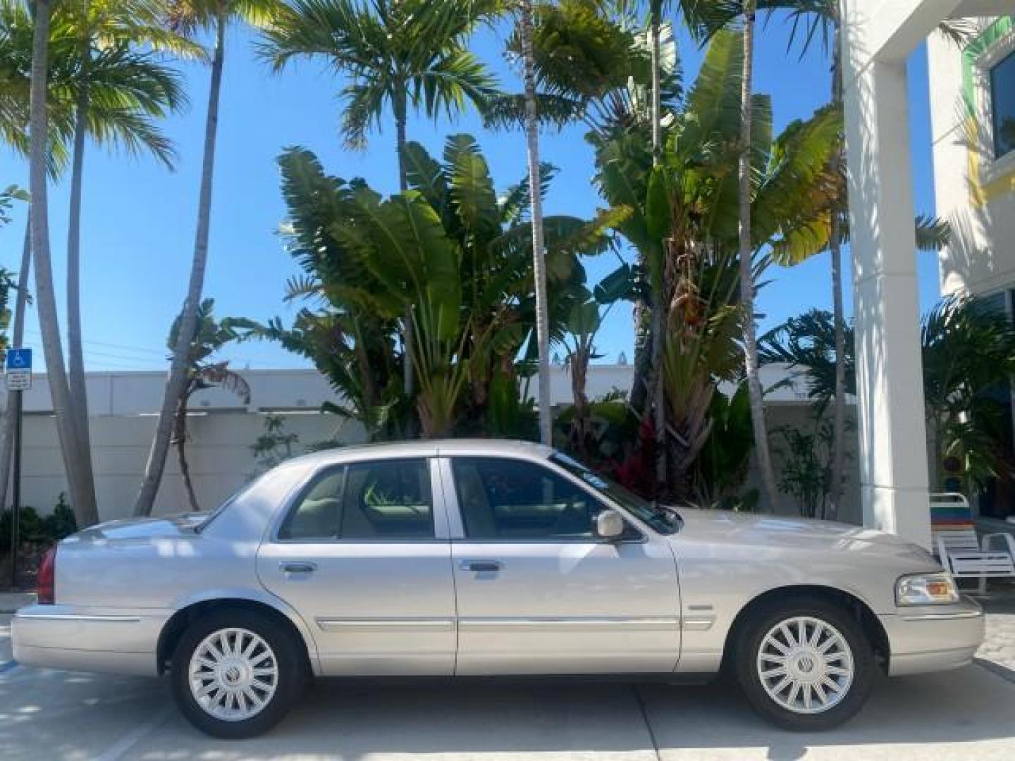 2009 Silver Birch Metallic /Light camel Mercury Grand Marquis LS LOW MILES 54,807 (2MEHM75V99X) with an 4.6L OHC SEFI FFV V8 Engine engine, Automatic transmission, located at 4701 North Dixie Hwy, Pompano Beach, FL, 33064, (954) 422-2889, 26.240938, -80.123474 - OUR WEBPAGE FLORIDACARS1.COM HAS OVER 100 PHOTOS AND FREE CARFAX LINK 2009 Mercury Grand Marquis LS Sedan 4 DR 4.6L V8 F SOHC 16V Flex Fuel 25 MPG Rear Wheel Drive Features ABS Brakes Air Conditioning Alloy Wheels AM/FM Stereo Automatic Transmission CD Audio Cruise Control Flex Fuel Vehicle Leather- Photo#92