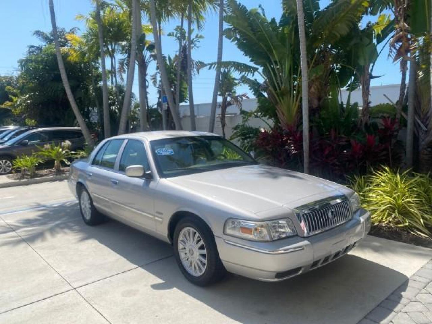 2009 Silver Birch Metallic /Light camel Mercury Grand Marquis LS LOW MILES 54,807 (2MEHM75V99X) with an 4.6L OHC SEFI FFV V8 Engine engine, Automatic transmission, located at 4701 North Dixie Hwy, Pompano Beach, FL, 33064, (954) 422-2889, 26.240938, -80.123474 - OUR WEBPAGE FLORIDACARS1.COM HAS OVER 100 PHOTOS AND FREE CARFAX LINK 2009 Mercury Grand Marquis LS Sedan 4 DR 4.6L V8 F SOHC 16V Flex Fuel 25 MPG Rear Wheel Drive Features ABS Brakes Air Conditioning Alloy Wheels AM/FM Stereo Automatic Transmission CD Audio Cruise Control Flex Fuel Vehicle Leather- Photo#93