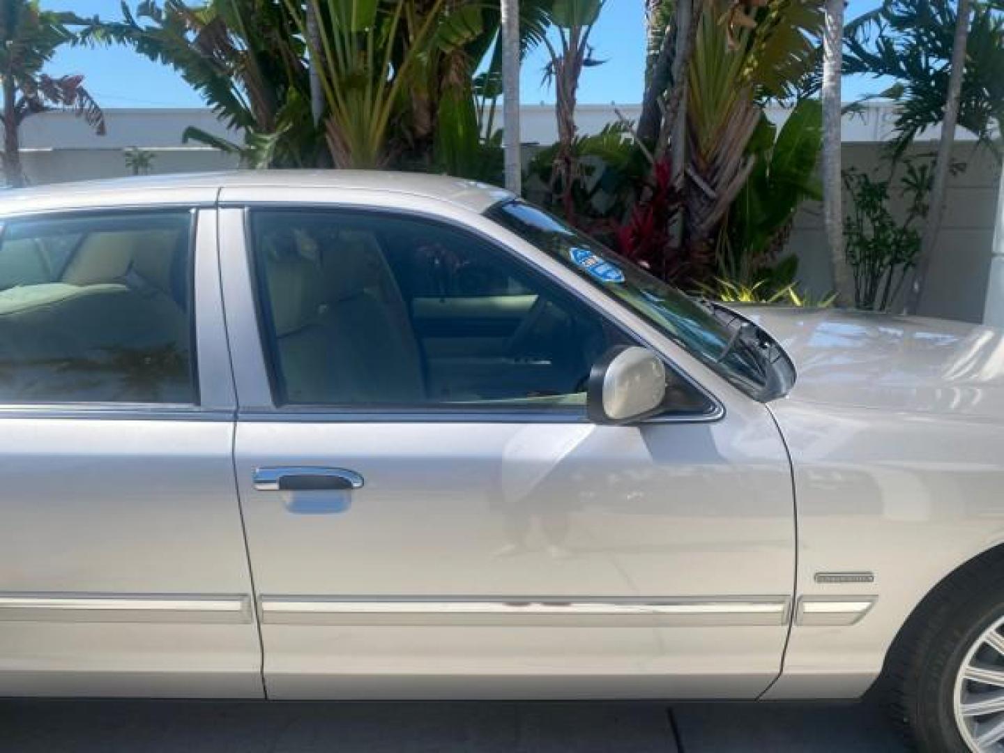 2009 Silver Birch Metallic /Light camel Mercury Grand Marquis LS LOW MILES 54,807 (2MEHM75V99X) with an 4.6L OHC SEFI FFV V8 Engine engine, Automatic transmission, located at 4701 North Dixie Hwy, Pompano Beach, FL, 33064, (954) 422-2889, 26.240938, -80.123474 - OUR WEBPAGE FLORIDACARS1.COM HAS OVER 100 PHOTOS AND FREE CARFAX LINK 2009 Mercury Grand Marquis LS Sedan 4 DR 4.6L V8 F SOHC 16V Flex Fuel 25 MPG Rear Wheel Drive Features ABS Brakes Air Conditioning Alloy Wheels AM/FM Stereo Automatic Transmission CD Audio Cruise Control Flex Fuel Vehicle Leather- Photo#99