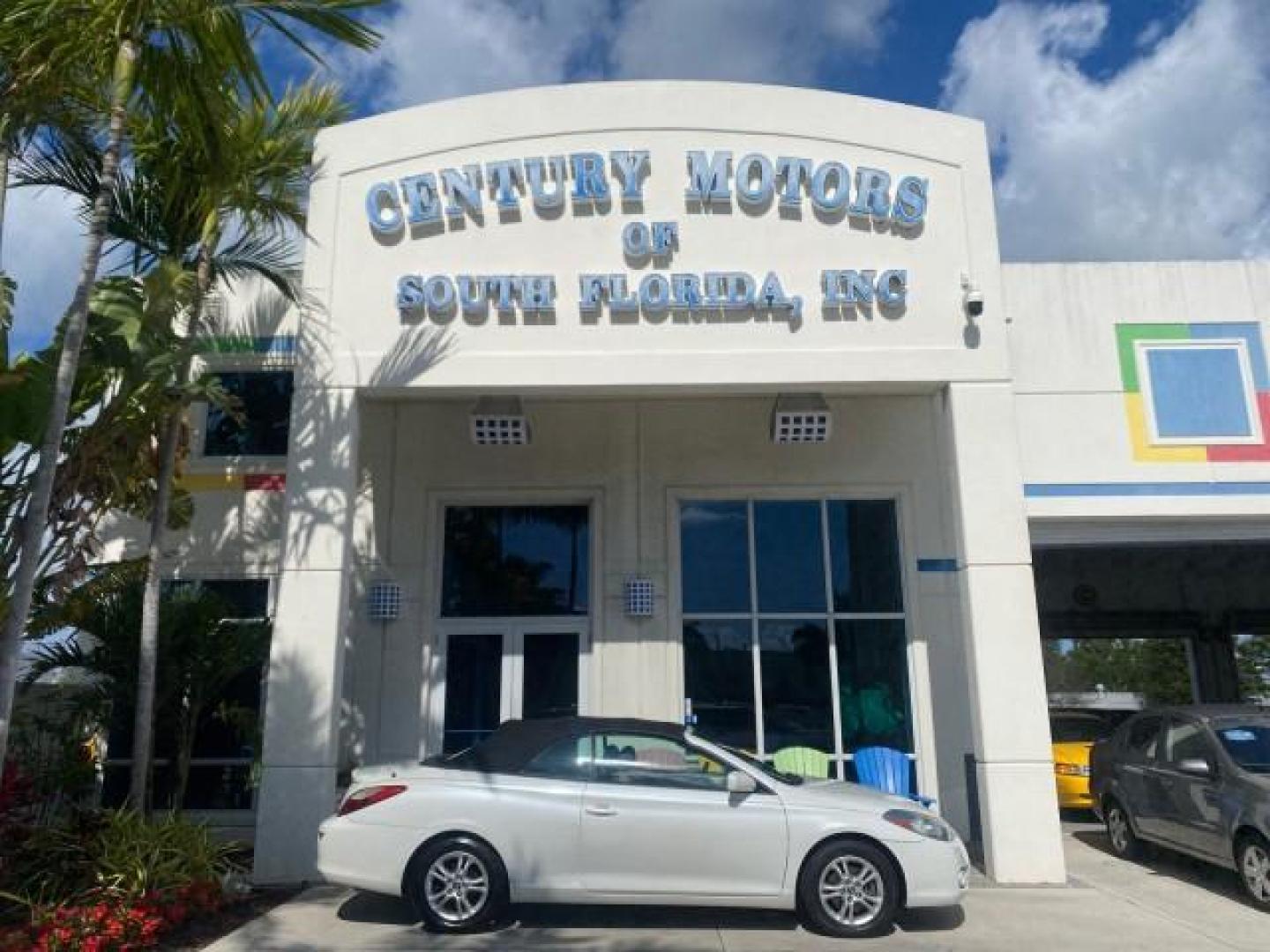 2008 Blizzard White Pearl /Dark Gray Toyota Camry Solara SE CONVERTIBLE LOW MILES 74,665 (4T1FA38PX8U) with an 3.3L DOHC SMPI VVT-i 24-Valve V6 Engine engine, Automatic transmission, located at 4701 North Dixie Hwy, Pompano Beach, FL, 33064, (954) 422-2889, 26.240938, -80.123474 - OUR WEBPAGE FLORIDACARS1.COM HAS OVER 100 PHOTOS AND FREE CARFAX LINK 2008 Toyota Camry Solara SE V6 Convertible 3.3L V6 F DOHC 24V Gasoline 29 MPG Front Wheel Drive Features ABS Brakes Air Conditioning Alloy Wheels AM/FM Stereo Automatic Transmission Auxiliary Audio Input CD Audio Cruise Control Le- Photo#0