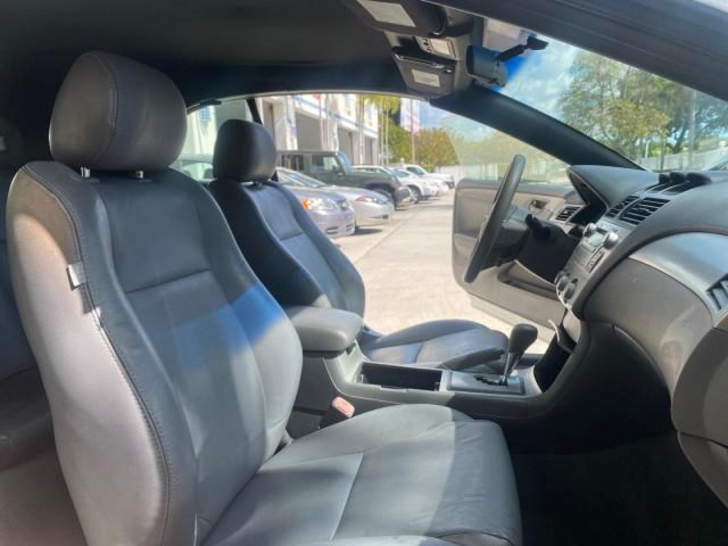 2008 Blizzard White Pearl /Dark Gray Toyota Camry Solara SE CONVERTIBLE LOW MILES 74,665 (4T1FA38PX8U) with an 3.3L DOHC SMPI VVT-i 24-Valve V6 Engine engine, Automatic transmission, located at 4701 North Dixie Hwy, Pompano Beach, FL, 33064, (954) 422-2889, 26.240938, -80.123474 - OUR WEBPAGE FLORIDACARS1.COM HAS OVER 100 PHOTOS AND FREE CARFAX LINK 2008 Toyota Camry Solara SE V6 Convertible 3.3L V6 F DOHC 24V Gasoline 29 MPG Front Wheel Drive Features ABS Brakes Air Conditioning Alloy Wheels AM/FM Stereo Automatic Transmission Auxiliary Audio Input CD Audio Cruise Control Le- Photo#12