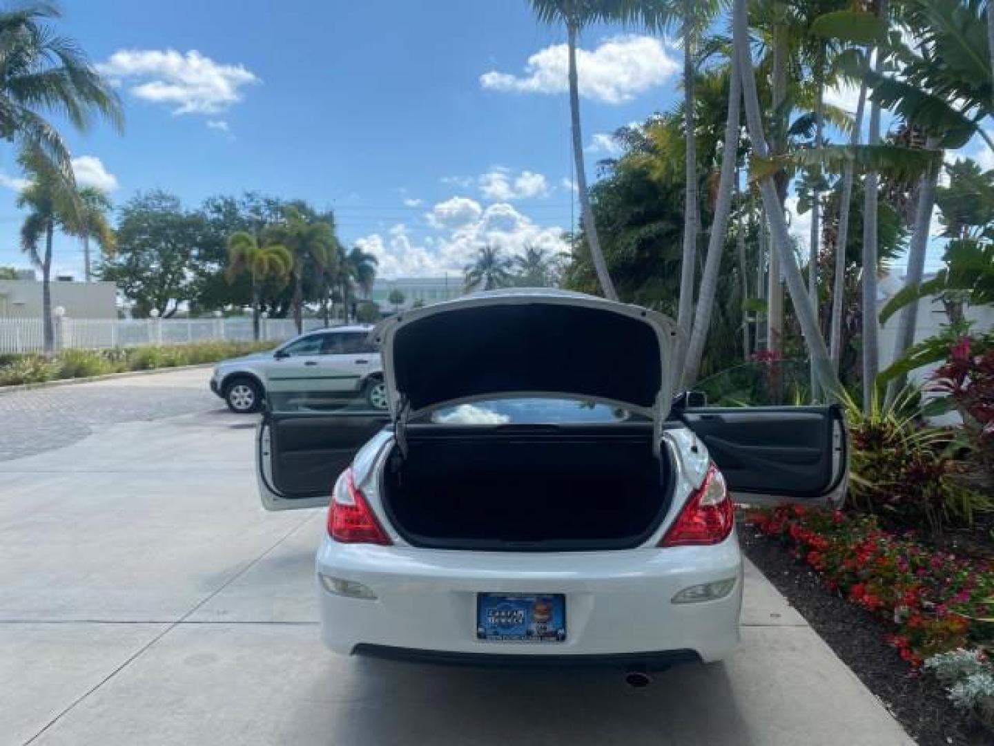 2008 Blizzard White Pearl /Dark Gray Toyota Camry Solara SE CONVERTIBLE LOW MILES 74,665 (4T1FA38PX8U) with an 3.3L DOHC SMPI VVT-i 24-Valve V6 Engine engine, Automatic transmission, located at 4701 North Dixie Hwy, Pompano Beach, FL, 33064, (954) 422-2889, 26.240938, -80.123474 - OUR WEBPAGE FLORIDACARS1.COM HAS OVER 100 PHOTOS AND FREE CARFAX LINK 2008 Toyota Camry Solara SE V6 Convertible 3.3L V6 F DOHC 24V Gasoline 29 MPG Front Wheel Drive Features ABS Brakes Air Conditioning Alloy Wheels AM/FM Stereo Automatic Transmission Auxiliary Audio Input CD Audio Cruise Control Le- Photo#15
