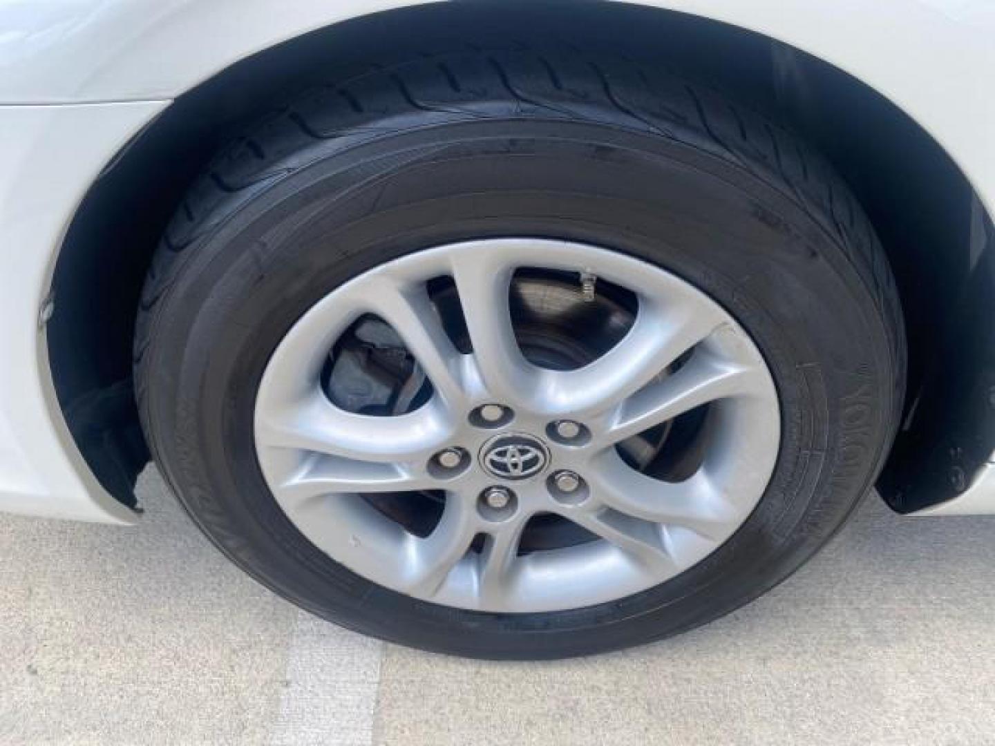 2008 Blizzard White Pearl /Dark Gray Toyota Camry Solara SE CONVERTIBLE LOW MILES 74,665 (4T1FA38PX8U) with an 3.3L DOHC SMPI VVT-i 24-Valve V6 Engine engine, Automatic transmission, located at 4701 North Dixie Hwy, Pompano Beach, FL, 33064, (954) 422-2889, 26.240938, -80.123474 - OUR WEBPAGE FLORIDACARS1.COM HAS OVER 100 PHOTOS AND FREE CARFAX LINK 2008 Toyota Camry Solara SE V6 Convertible 3.3L V6 F DOHC 24V Gasoline 29 MPG Front Wheel Drive Features ABS Brakes Air Conditioning Alloy Wheels AM/FM Stereo Automatic Transmission Auxiliary Audio Input CD Audio Cruise Control Le- Photo#19