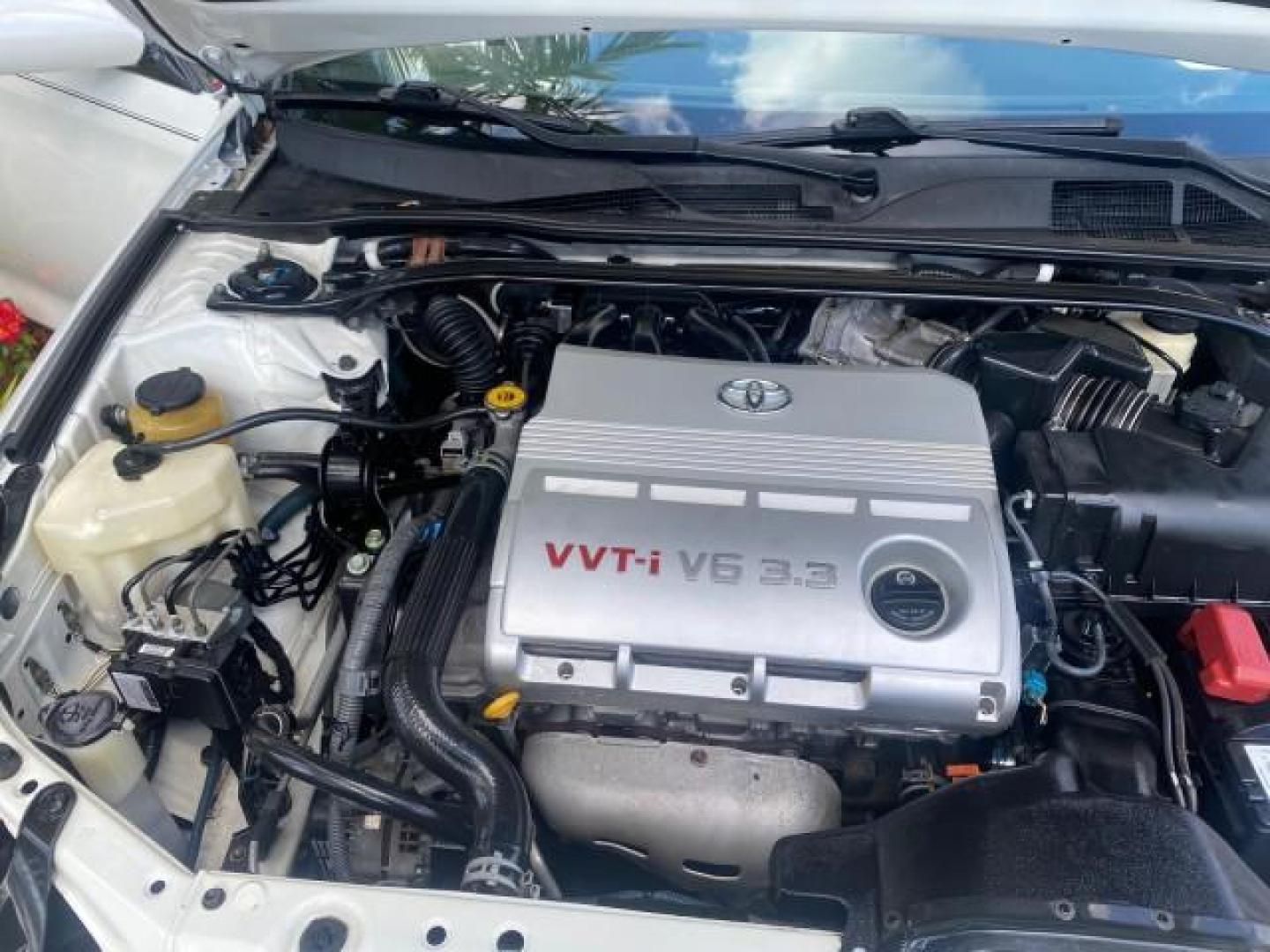 2008 Blizzard White Pearl /Dark Gray Toyota Camry Solara SE CONVERTIBLE LOW MILES 74,665 (4T1FA38PX8U) with an 3.3L DOHC SMPI VVT-i 24-Valve V6 Engine engine, Automatic transmission, located at 4701 North Dixie Hwy, Pompano Beach, FL, 33064, (954) 422-2889, 26.240938, -80.123474 - OUR WEBPAGE FLORIDACARS1.COM HAS OVER 100 PHOTOS AND FREE CARFAX LINK 2008 Toyota Camry Solara SE V6 Convertible 3.3L V6 F DOHC 24V Gasoline 29 MPG Front Wheel Drive Features ABS Brakes Air Conditioning Alloy Wheels AM/FM Stereo Automatic Transmission Auxiliary Audio Input CD Audio Cruise Control Le- Photo#24