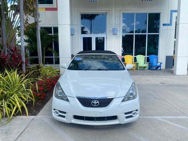 2008 Blizzard White Pearl /Dark Gray Toyota Camry Solara SE CONVERTIBLE LOW MILES 74,665 (4T1FA38PX8U) with an 3.3L DOHC SMPI VVT-i 24-Valve V6 Engine engine, Automatic transmission, located at 4701 North Dixie Hwy, Pompano Beach, FL, 33064, (954) 422-2889, 26.240938, -80.123474 - OUR WEBPAGE FLORIDACARS1.COM HAS OVER 100 PHOTOS AND FREE CARFAX LINK 2008 Toyota Camry Solara SE V6 Convertible 3.3L V6 F DOHC 24V Gasoline 29 MPG Front Wheel Drive Features ABS Brakes Air Conditioning Alloy Wheels AM/FM Stereo Automatic Transmission Auxiliary Audio Input CD Audio Cruise Control Le - Photo#26