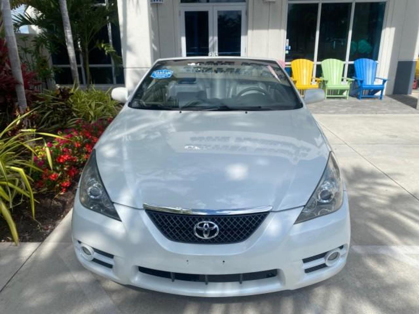 2008 Blizzard White Pearl /Dark Gray Toyota Camry Solara SE CONVERTIBLE LOW MILES 74,665 (4T1FA38PX8U) with an 3.3L DOHC SMPI VVT-i 24-Valve V6 Engine engine, Automatic transmission, located at 4701 North Dixie Hwy, Pompano Beach, FL, 33064, (954) 422-2889, 26.240938, -80.123474 - OUR WEBPAGE FLORIDACARS1.COM HAS OVER 100 PHOTOS AND FREE CARFAX LINK 2008 Toyota Camry Solara SE V6 Convertible 3.3L V6 F DOHC 24V Gasoline 29 MPG Front Wheel Drive Features ABS Brakes Air Conditioning Alloy Wheels AM/FM Stereo Automatic Transmission Auxiliary Audio Input CD Audio Cruise Control Le- Photo#29