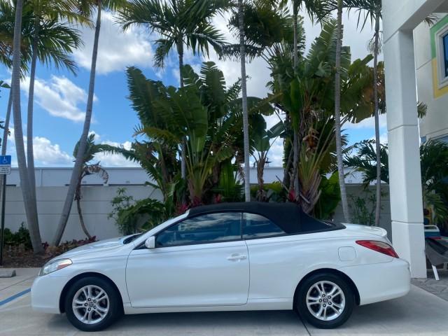 2008 Blizzard White Pearl /Dark Gray Toyota Camry Solara SE CONVERTIBLE LOW MILES 74,665 (4T1FA38PX8U) with an 3.3L DOHC SMPI VVT-i 24-Valve V6 Engine engine, Automatic transmission, located at 4701 North Dixie Hwy, Pompano Beach, FL, 33064, (954) 422-2889, 26.240938, -80.123474 - OUR WEBPAGE FLORIDACARS1.COM HAS OVER 100 PHOTOS AND FREE CARFAX LINK 2008 Toyota Camry Solara SE V6 Convertible 3.3L V6 F DOHC 24V Gasoline 29 MPG Front Wheel Drive Features ABS Brakes Air Conditioning Alloy Wheels AM/FM Stereo Automatic Transmission Auxiliary Audio Input CD Audio Cruise Control Le - Photo#36