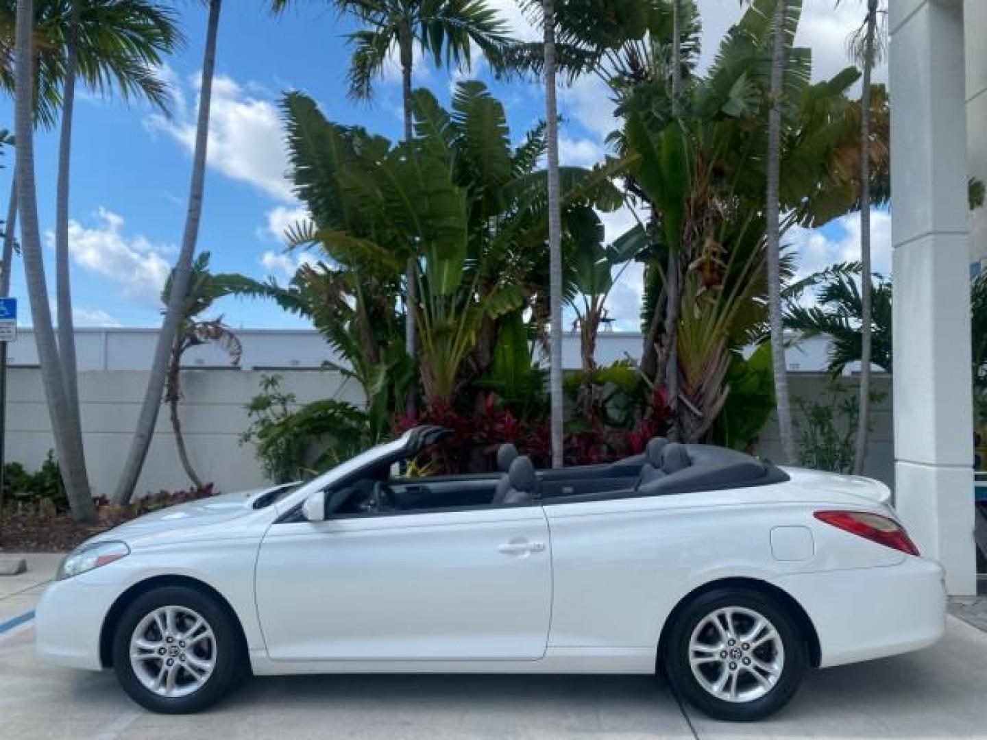2008 Blizzard White Pearl /Dark Gray Toyota Camry Solara SE CONVERTIBLE LOW MILES 74,665 (4T1FA38PX8U) with an 3.3L DOHC SMPI VVT-i 24-Valve V6 Engine engine, Automatic transmission, located at 4701 North Dixie Hwy, Pompano Beach, FL, 33064, (954) 422-2889, 26.240938, -80.123474 - OUR WEBPAGE FLORIDACARS1.COM HAS OVER 100 PHOTOS AND FREE CARFAX LINK 2008 Toyota Camry Solara SE V6 Convertible 3.3L V6 F DOHC 24V Gasoline 29 MPG Front Wheel Drive Features ABS Brakes Air Conditioning Alloy Wheels AM/FM Stereo Automatic Transmission Auxiliary Audio Input CD Audio Cruise Control Le- Photo#37