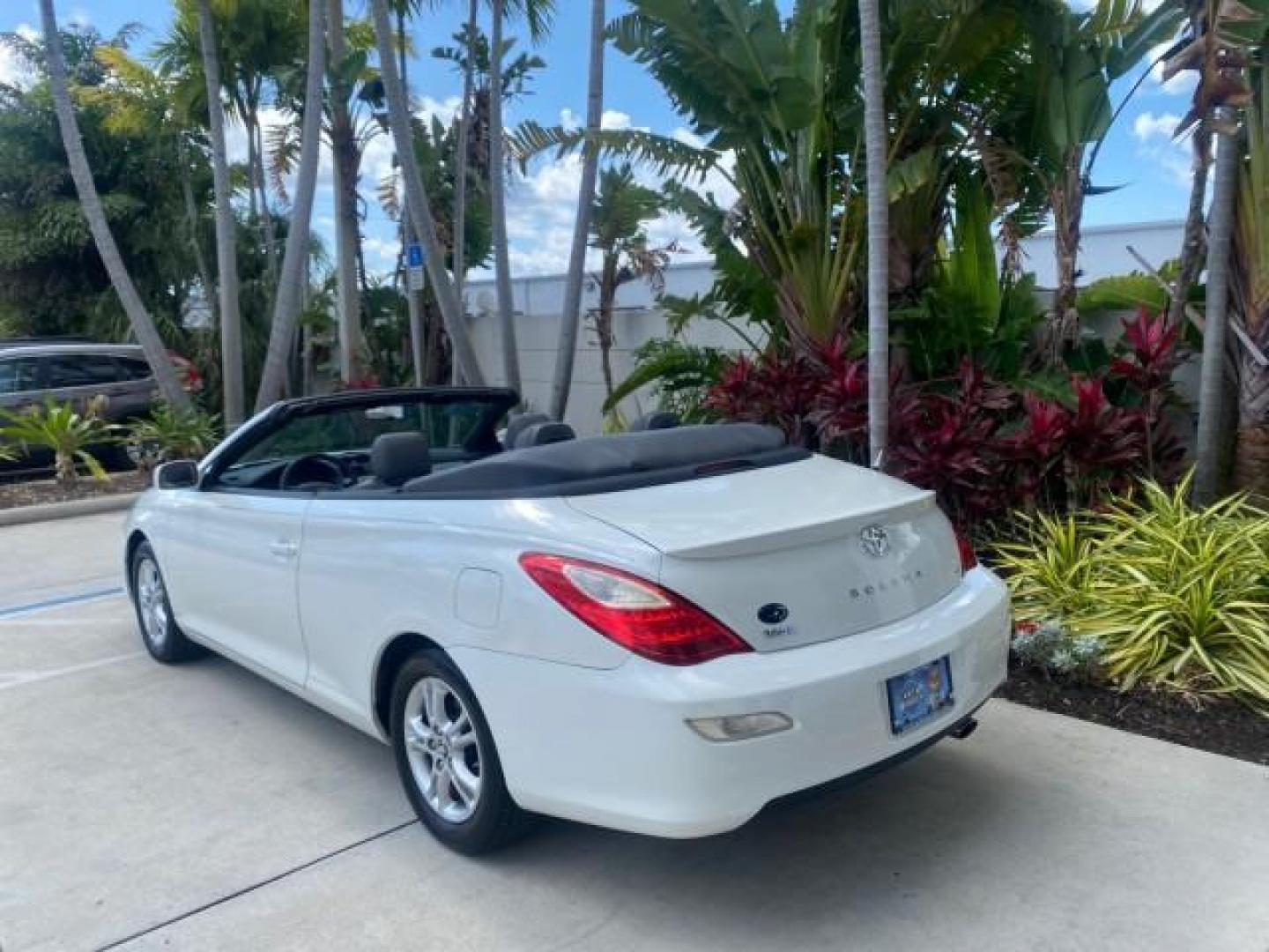 2008 Blizzard White Pearl /Dark Gray Toyota Camry Solara SE CONVERTIBLE LOW MILES 74,665 (4T1FA38PX8U) with an 3.3L DOHC SMPI VVT-i 24-Valve V6 Engine engine, Automatic transmission, located at 4701 North Dixie Hwy, Pompano Beach, FL, 33064, (954) 422-2889, 26.240938, -80.123474 - OUR WEBPAGE FLORIDACARS1.COM HAS OVER 100 PHOTOS AND FREE CARFAX LINK 2008 Toyota Camry Solara SE V6 Convertible 3.3L V6 F DOHC 24V Gasoline 29 MPG Front Wheel Drive Features ABS Brakes Air Conditioning Alloy Wheels AM/FM Stereo Automatic Transmission Auxiliary Audio Input CD Audio Cruise Control Le- Photo#39