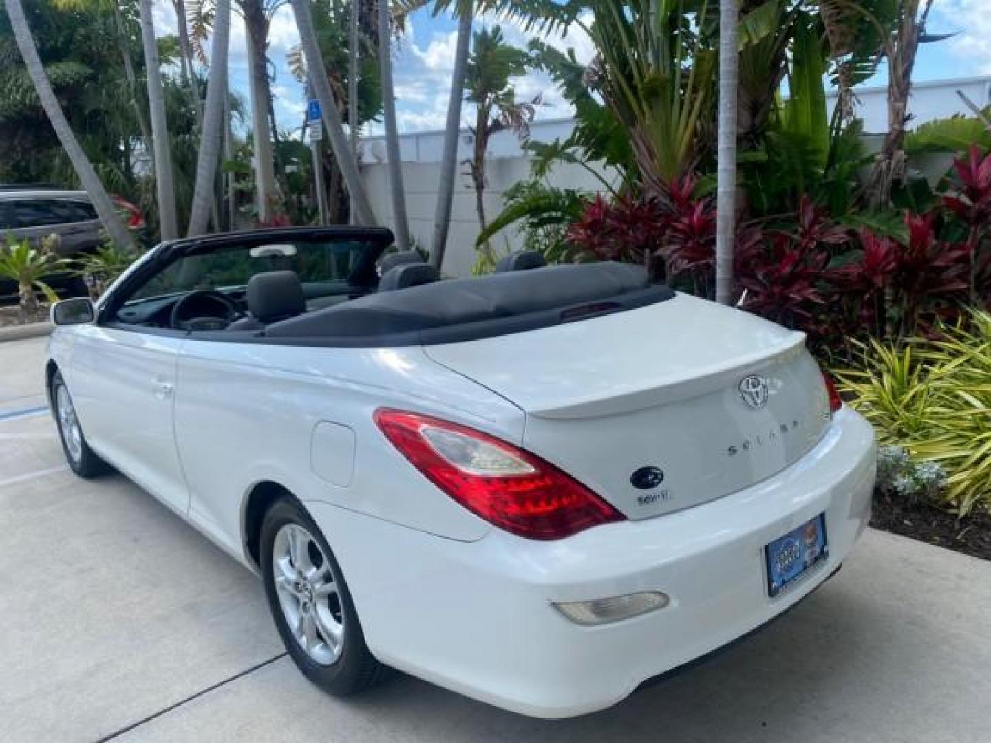 2008 Blizzard White Pearl /Dark Gray Toyota Camry Solara SE CONVERTIBLE LOW MILES 74,665 (4T1FA38PX8U) with an 3.3L DOHC SMPI VVT-i 24-Valve V6 Engine engine, Automatic transmission, located at 4701 North Dixie Hwy, Pompano Beach, FL, 33064, (954) 422-2889, 26.240938, -80.123474 - OUR WEBPAGE FLORIDACARS1.COM HAS OVER 100 PHOTOS AND FREE CARFAX LINK 2008 Toyota Camry Solara SE V6 Convertible 3.3L V6 F DOHC 24V Gasoline 29 MPG Front Wheel Drive Features ABS Brakes Air Conditioning Alloy Wheels AM/FM Stereo Automatic Transmission Auxiliary Audio Input CD Audio Cruise Control Le- Photo#41
