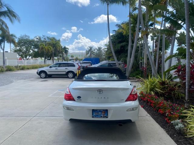 2008 Blizzard White Pearl /Dark Gray Toyota Camry Solara SE CONVERTIBLE LOW MILES 74,665 (4T1FA38PX8U) with an 3.3L DOHC SMPI VVT-i 24-Valve V6 Engine engine, Automatic transmission, located at 4701 North Dixie Hwy, Pompano Beach, FL, 33064, (954) 422-2889, 26.240938, -80.123474 - OUR WEBPAGE FLORIDACARS1.COM HAS OVER 100 PHOTOS AND FREE CARFAX LINK 2008 Toyota Camry Solara SE V6 Convertible 3.3L V6 F DOHC 24V Gasoline 29 MPG Front Wheel Drive Features ABS Brakes Air Conditioning Alloy Wheels AM/FM Stereo Automatic Transmission Auxiliary Audio Input CD Audio Cruise Control Le - Photo#42