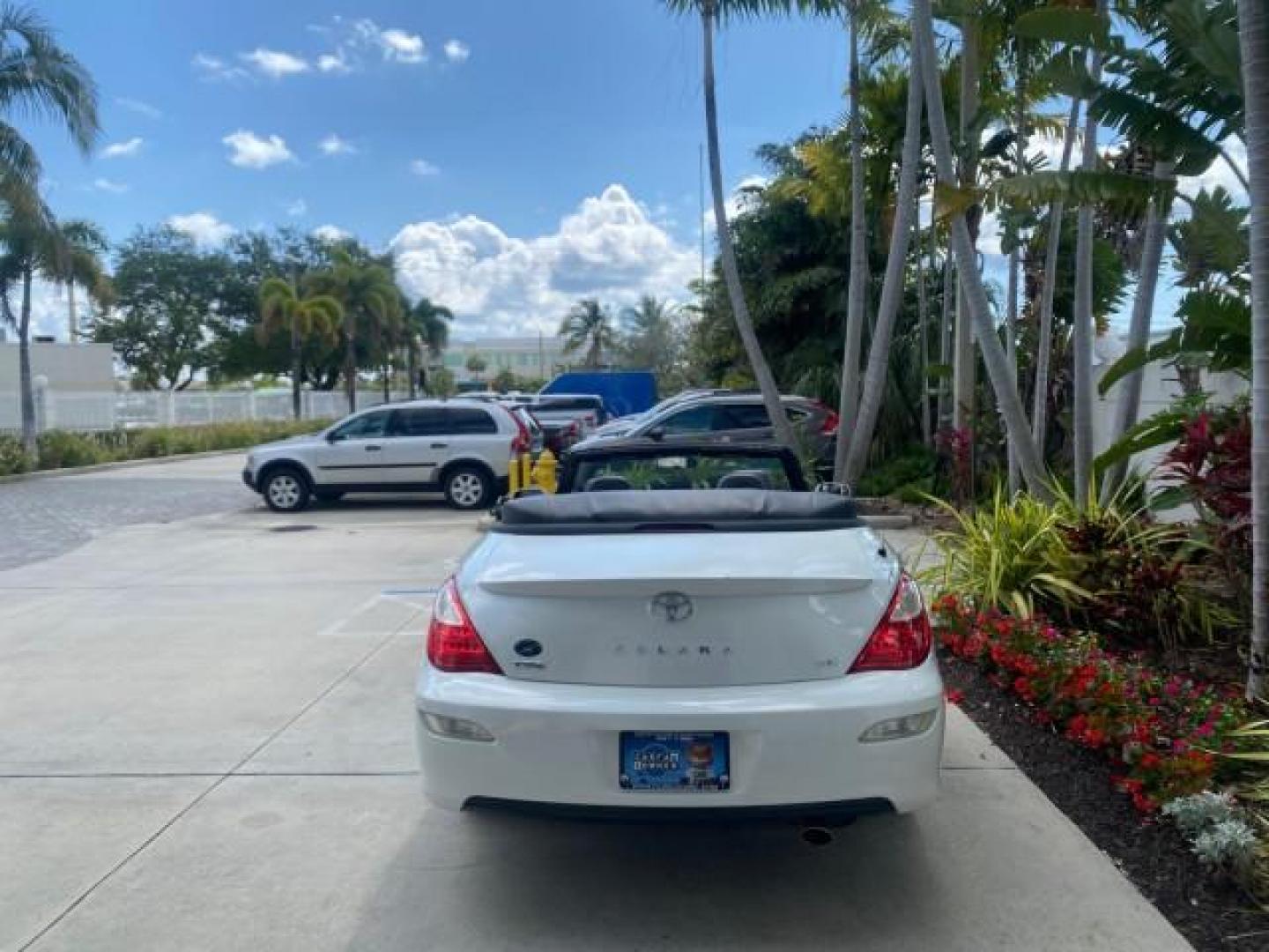 2008 Blizzard White Pearl /Dark Gray Toyota Camry Solara SE CONVERTIBLE LOW MILES 74,665 (4T1FA38PX8U) with an 3.3L DOHC SMPI VVT-i 24-Valve V6 Engine engine, Automatic transmission, located at 4701 North Dixie Hwy, Pompano Beach, FL, 33064, (954) 422-2889, 26.240938, -80.123474 - OUR WEBPAGE FLORIDACARS1.COM HAS OVER 100 PHOTOS AND FREE CARFAX LINK 2008 Toyota Camry Solara SE V6 Convertible 3.3L V6 F DOHC 24V Gasoline 29 MPG Front Wheel Drive Features ABS Brakes Air Conditioning Alloy Wheels AM/FM Stereo Automatic Transmission Auxiliary Audio Input CD Audio Cruise Control Le- Photo#43