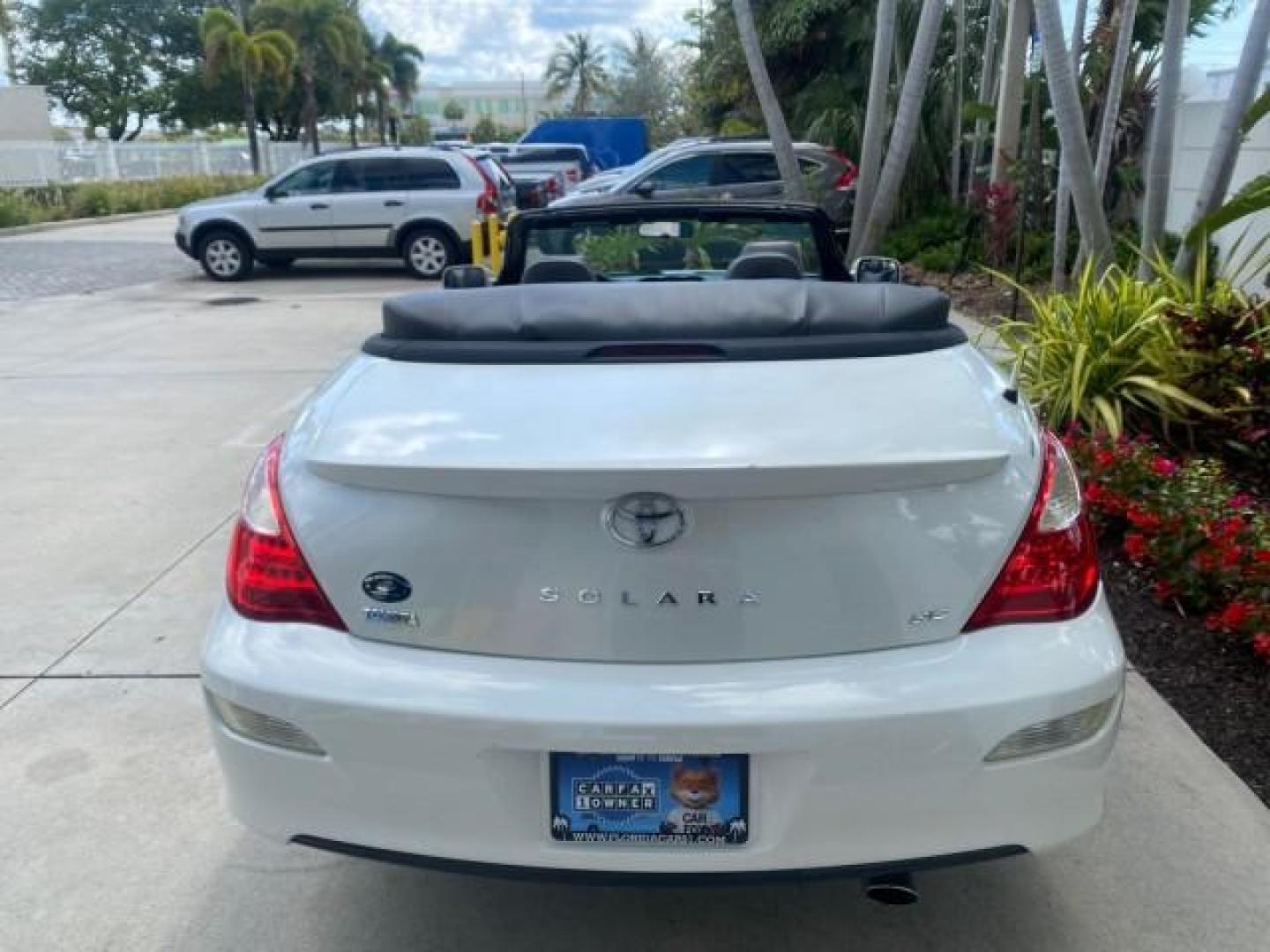 2008 Blizzard White Pearl /Dark Gray Toyota Camry Solara SE CONVERTIBLE LOW MILES 74,665 (4T1FA38PX8U) with an 3.3L DOHC SMPI VVT-i 24-Valve V6 Engine engine, Automatic transmission, located at 4701 North Dixie Hwy, Pompano Beach, FL, 33064, (954) 422-2889, 26.240938, -80.123474 - OUR WEBPAGE FLORIDACARS1.COM HAS OVER 100 PHOTOS AND FREE CARFAX LINK 2008 Toyota Camry Solara SE V6 Convertible 3.3L V6 F DOHC 24V Gasoline 29 MPG Front Wheel Drive Features ABS Brakes Air Conditioning Alloy Wheels AM/FM Stereo Automatic Transmission Auxiliary Audio Input CD Audio Cruise Control Le- Photo#45
