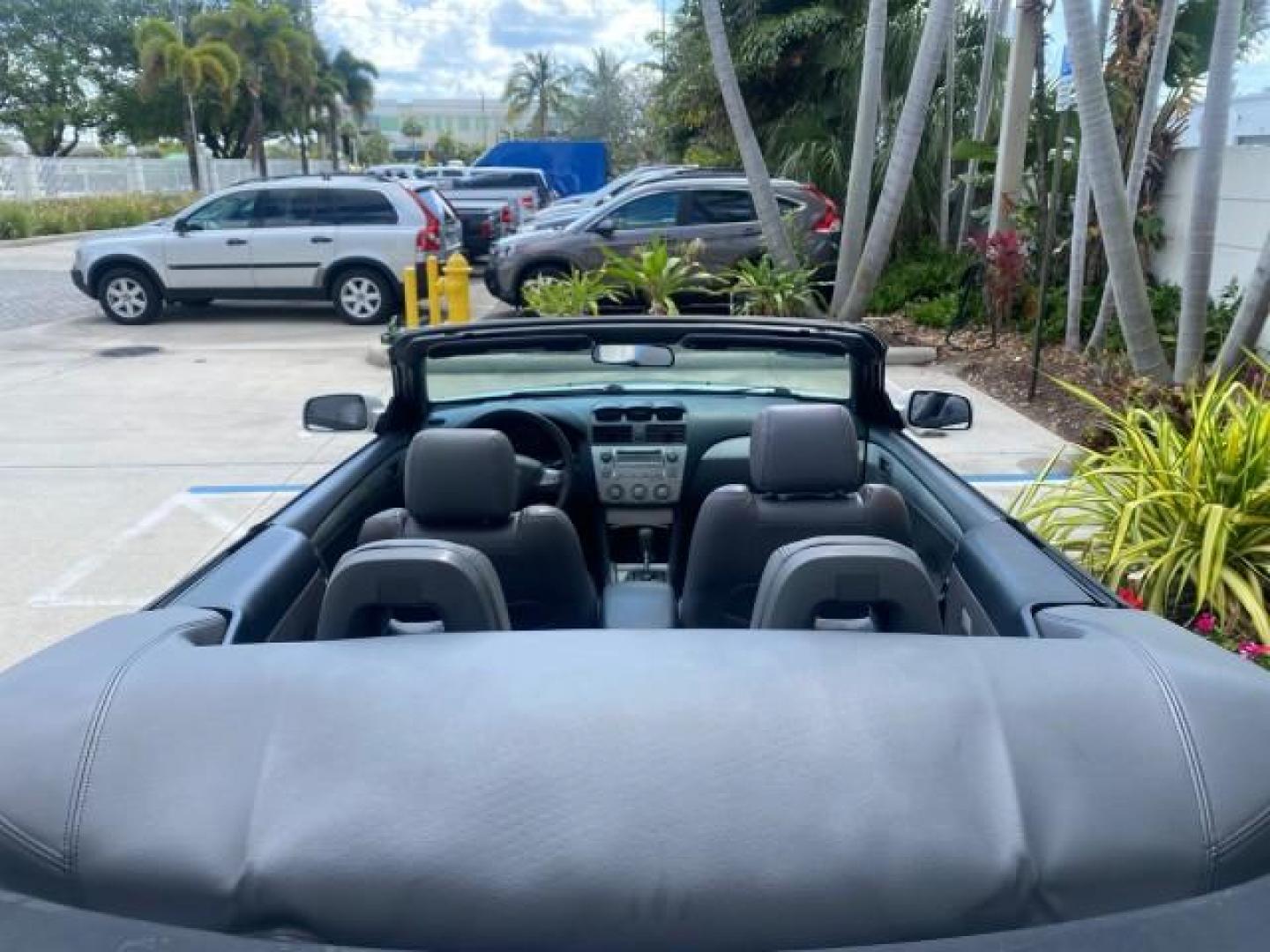 2008 Blizzard White Pearl /Dark Gray Toyota Camry Solara SE CONVERTIBLE LOW MILES 74,665 (4T1FA38PX8U) with an 3.3L DOHC SMPI VVT-i 24-Valve V6 Engine engine, Automatic transmission, located at 4701 North Dixie Hwy, Pompano Beach, FL, 33064, (954) 422-2889, 26.240938, -80.123474 - OUR WEBPAGE FLORIDACARS1.COM HAS OVER 100 PHOTOS AND FREE CARFAX LINK 2008 Toyota Camry Solara SE V6 Convertible 3.3L V6 F DOHC 24V Gasoline 29 MPG Front Wheel Drive Features ABS Brakes Air Conditioning Alloy Wheels AM/FM Stereo Automatic Transmission Auxiliary Audio Input CD Audio Cruise Control Le- Photo#46