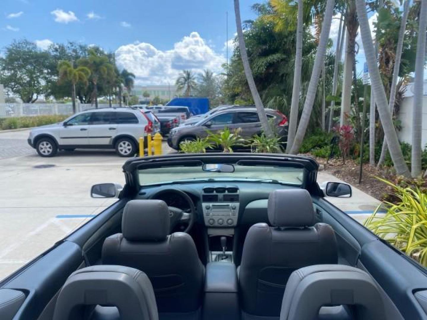 2008 Blizzard White Pearl /Dark Gray Toyota Camry Solara SE CONVERTIBLE LOW MILES 74,665 (4T1FA38PX8U) with an 3.3L DOHC SMPI VVT-i 24-Valve V6 Engine engine, Automatic transmission, located at 4701 North Dixie Hwy, Pompano Beach, FL, 33064, (954) 422-2889, 26.240938, -80.123474 - OUR WEBPAGE FLORIDACARS1.COM HAS OVER 100 PHOTOS AND FREE CARFAX LINK 2008 Toyota Camry Solara SE V6 Convertible 3.3L V6 F DOHC 24V Gasoline 29 MPG Front Wheel Drive Features ABS Brakes Air Conditioning Alloy Wheels AM/FM Stereo Automatic Transmission Auxiliary Audio Input CD Audio Cruise Control Le- Photo#47