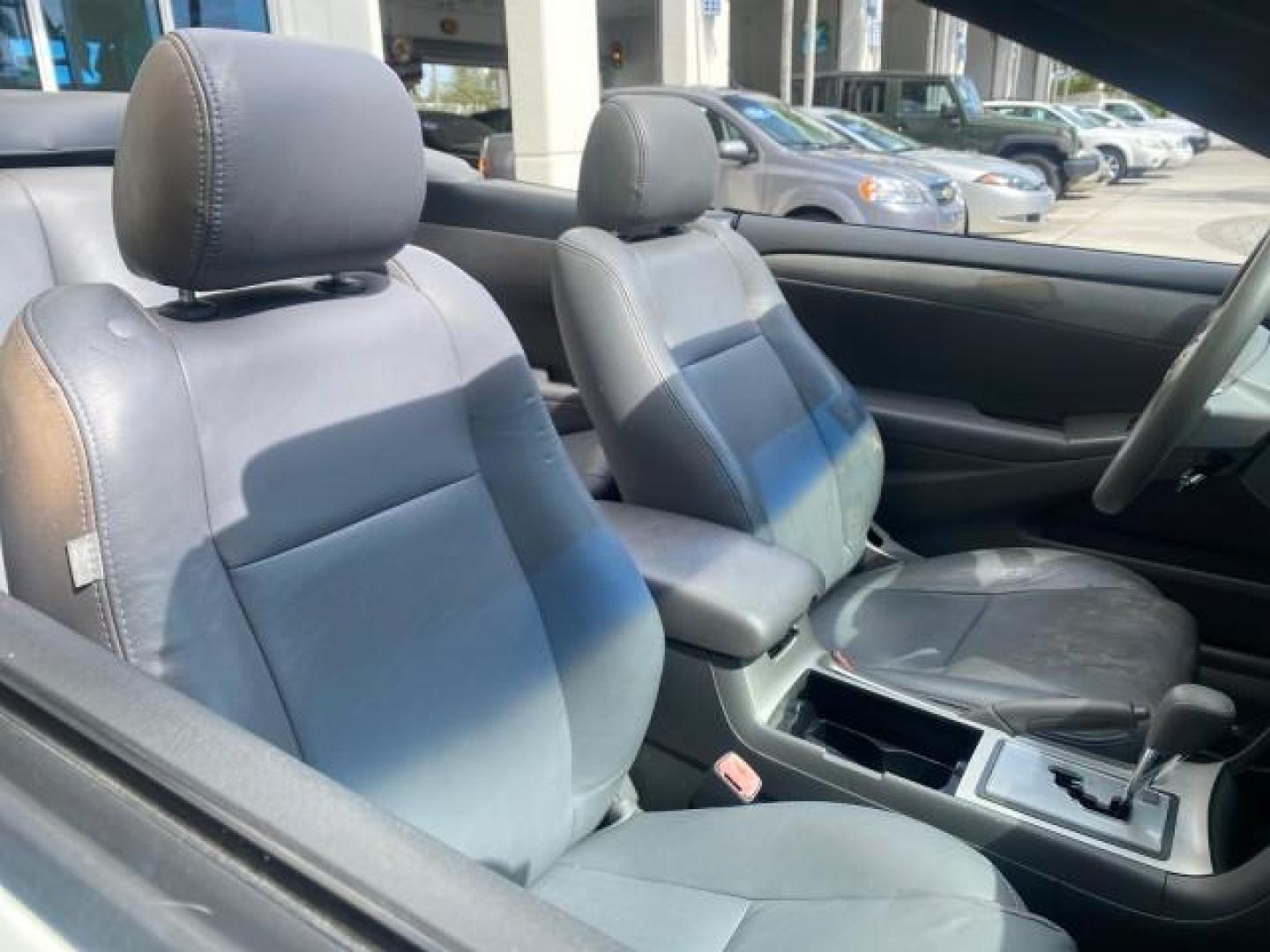2008 Blizzard White Pearl /Dark Gray Toyota Camry Solara SE CONVERTIBLE LOW MILES 74,665 (4T1FA38PX8U) with an 3.3L DOHC SMPI VVT-i 24-Valve V6 Engine engine, Automatic transmission, located at 4701 North Dixie Hwy, Pompano Beach, FL, 33064, (954) 422-2889, 26.240938, -80.123474 - OUR WEBPAGE FLORIDACARS1.COM HAS OVER 100 PHOTOS AND FREE CARFAX LINK 2008 Toyota Camry Solara SE V6 Convertible 3.3L V6 F DOHC 24V Gasoline 29 MPG Front Wheel Drive Features ABS Brakes Air Conditioning Alloy Wheels AM/FM Stereo Automatic Transmission Auxiliary Audio Input CD Audio Cruise Control Le- Photo#54