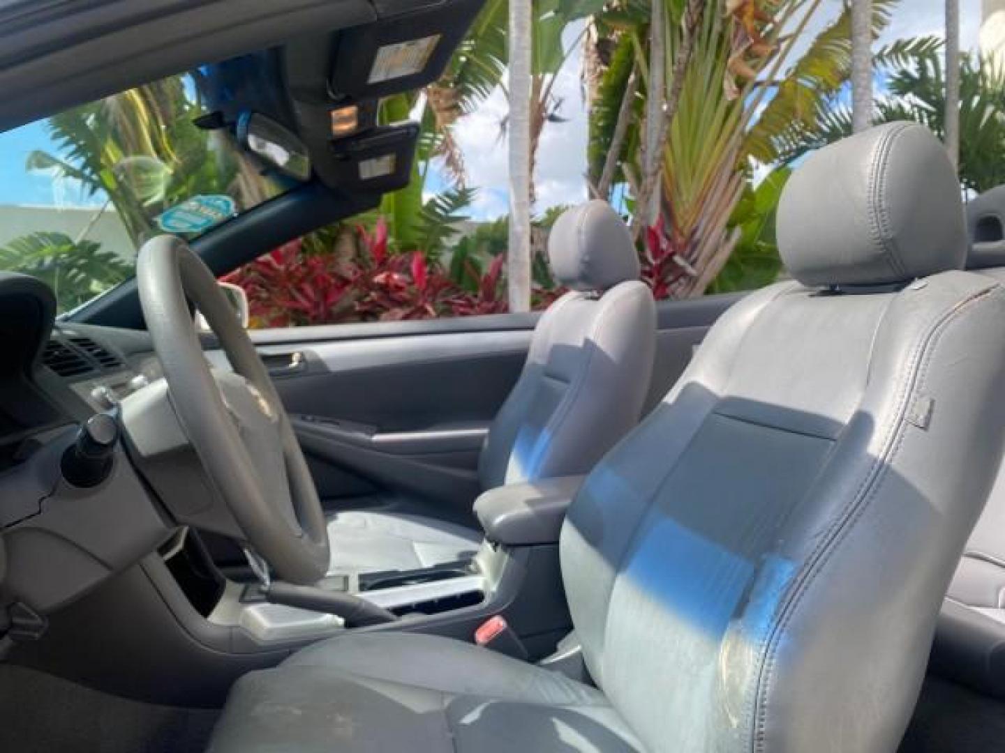 2008 Blizzard White Pearl /Dark Gray Toyota Camry Solara SE CONVERTIBLE LOW MILES 74,665 (4T1FA38PX8U) with an 3.3L DOHC SMPI VVT-i 24-Valve V6 Engine engine, Automatic transmission, located at 4701 North Dixie Hwy, Pompano Beach, FL, 33064, (954) 422-2889, 26.240938, -80.123474 - OUR WEBPAGE FLORIDACARS1.COM HAS OVER 100 PHOTOS AND FREE CARFAX LINK 2008 Toyota Camry Solara SE V6 Convertible 3.3L V6 F DOHC 24V Gasoline 29 MPG Front Wheel Drive Features ABS Brakes Air Conditioning Alloy Wheels AM/FM Stereo Automatic Transmission Auxiliary Audio Input CD Audio Cruise Control Le- Photo#73