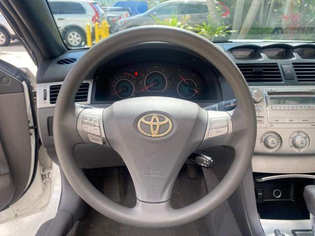 2008 Blizzard White Pearl /Dark Gray Toyota Camry Solara SE CONVERTIBLE LOW MILES 74,665 (4T1FA38PX8U) with an 3.3L DOHC SMPI VVT-i 24-Valve V6 Engine engine, Automatic transmission, located at 4701 North Dixie Hwy, Pompano Beach, FL, 33064, (954) 422-2889, 26.240938, -80.123474 - OUR WEBPAGE FLORIDACARS1.COM HAS OVER 100 PHOTOS AND FREE CARFAX LINK 2008 Toyota Camry Solara SE V6 Convertible 3.3L V6 F DOHC 24V Gasoline 29 MPG Front Wheel Drive Features ABS Brakes Air Conditioning Alloy Wheels AM/FM Stereo Automatic Transmission Auxiliary Audio Input CD Audio Cruise Control Le - Photo#71