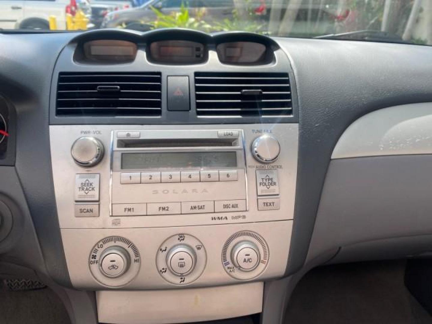 2008 Blizzard White Pearl /Dark Gray Toyota Camry Solara SE CONVERTIBLE LOW MILES 74,665 (4T1FA38PX8U) with an 3.3L DOHC SMPI VVT-i 24-Valve V6 Engine engine, Automatic transmission, located at 4701 North Dixie Hwy, Pompano Beach, FL, 33064, (954) 422-2889, 26.240938, -80.123474 - OUR WEBPAGE FLORIDACARS1.COM HAS OVER 100 PHOTOS AND FREE CARFAX LINK 2008 Toyota Camry Solara SE V6 Convertible 3.3L V6 F DOHC 24V Gasoline 29 MPG Front Wheel Drive Features ABS Brakes Air Conditioning Alloy Wheels AM/FM Stereo Automatic Transmission Auxiliary Audio Input CD Audio Cruise Control Le- Photo#88
