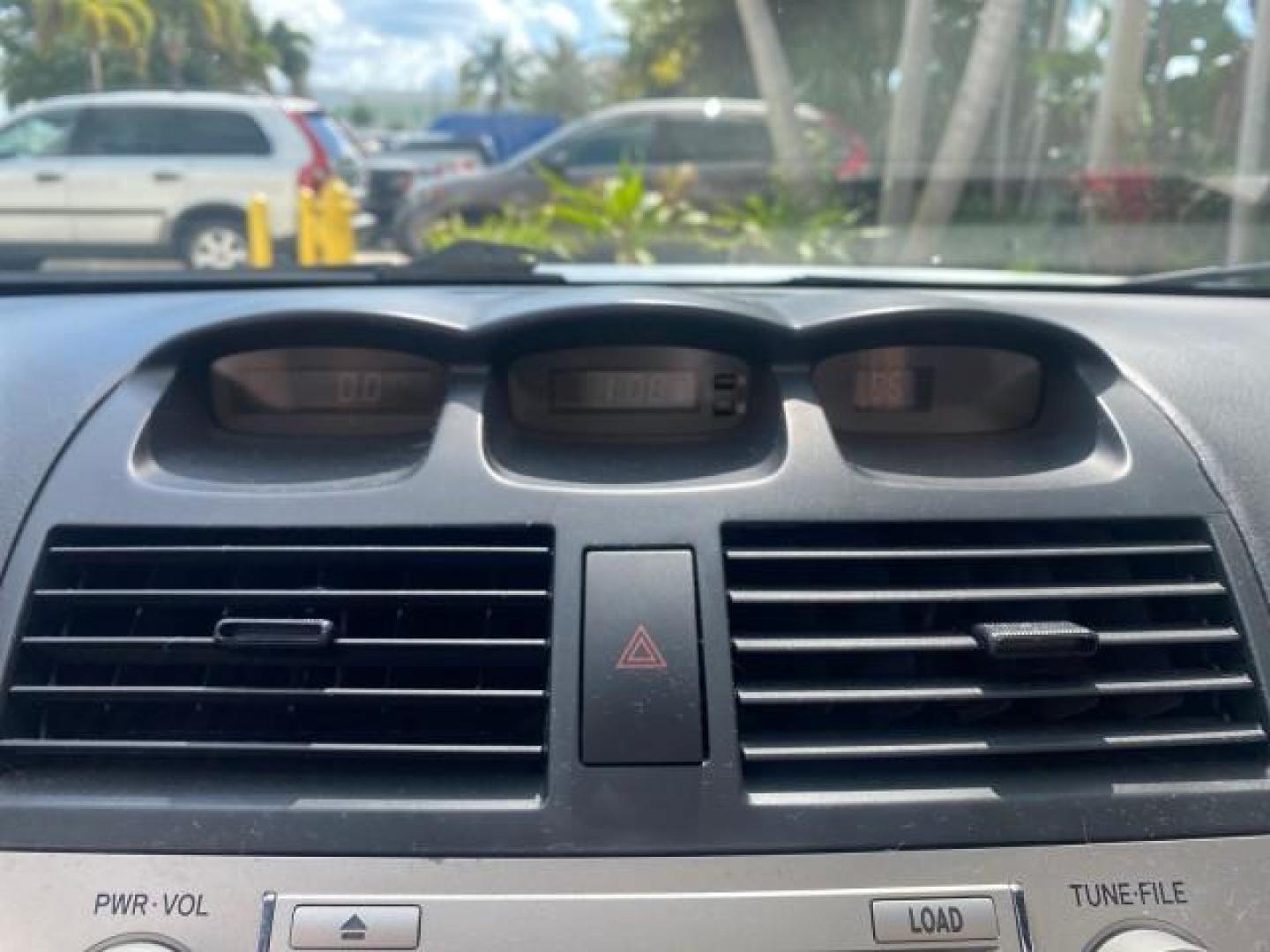 2008 Blizzard White Pearl /Dark Gray Toyota Camry Solara SE CONVERTIBLE LOW MILES 74,665 (4T1FA38PX8U) with an 3.3L DOHC SMPI VVT-i 24-Valve V6 Engine engine, Automatic transmission, located at 4701 North Dixie Hwy, Pompano Beach, FL, 33064, (954) 422-2889, 26.240938, -80.123474 - OUR WEBPAGE FLORIDACARS1.COM HAS OVER 100 PHOTOS AND FREE CARFAX LINK 2008 Toyota Camry Solara SE V6 Convertible 3.3L V6 F DOHC 24V Gasoline 29 MPG Front Wheel Drive Features ABS Brakes Air Conditioning Alloy Wheels AM/FM Stereo Automatic Transmission Auxiliary Audio Input CD Audio Cruise Control Le- Photo#89