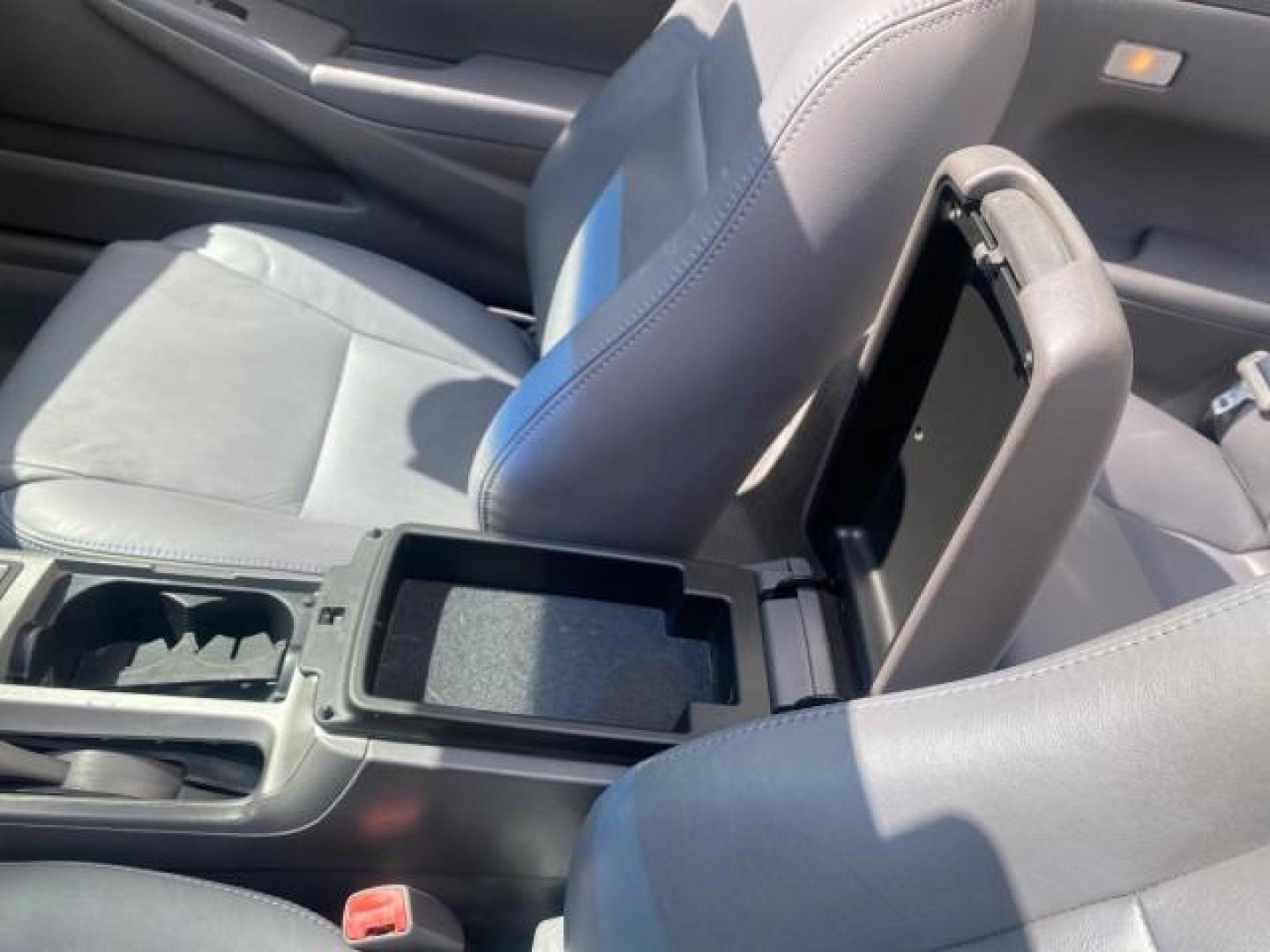 2008 Blizzard White Pearl /Dark Gray Toyota Camry Solara SE CONVERTIBLE LOW MILES 74,665 (4T1FA38PX8U) with an 3.3L DOHC SMPI VVT-i 24-Valve V6 Engine engine, Automatic transmission, located at 4701 North Dixie Hwy, Pompano Beach, FL, 33064, (954) 422-2889, 26.240938, -80.123474 - OUR WEBPAGE FLORIDACARS1.COM HAS OVER 100 PHOTOS AND FREE CARFAX LINK 2008 Toyota Camry Solara SE V6 Convertible 3.3L V6 F DOHC 24V Gasoline 29 MPG Front Wheel Drive Features ABS Brakes Air Conditioning Alloy Wheels AM/FM Stereo Automatic Transmission Auxiliary Audio Input CD Audio Cruise Control Le- Photo#96