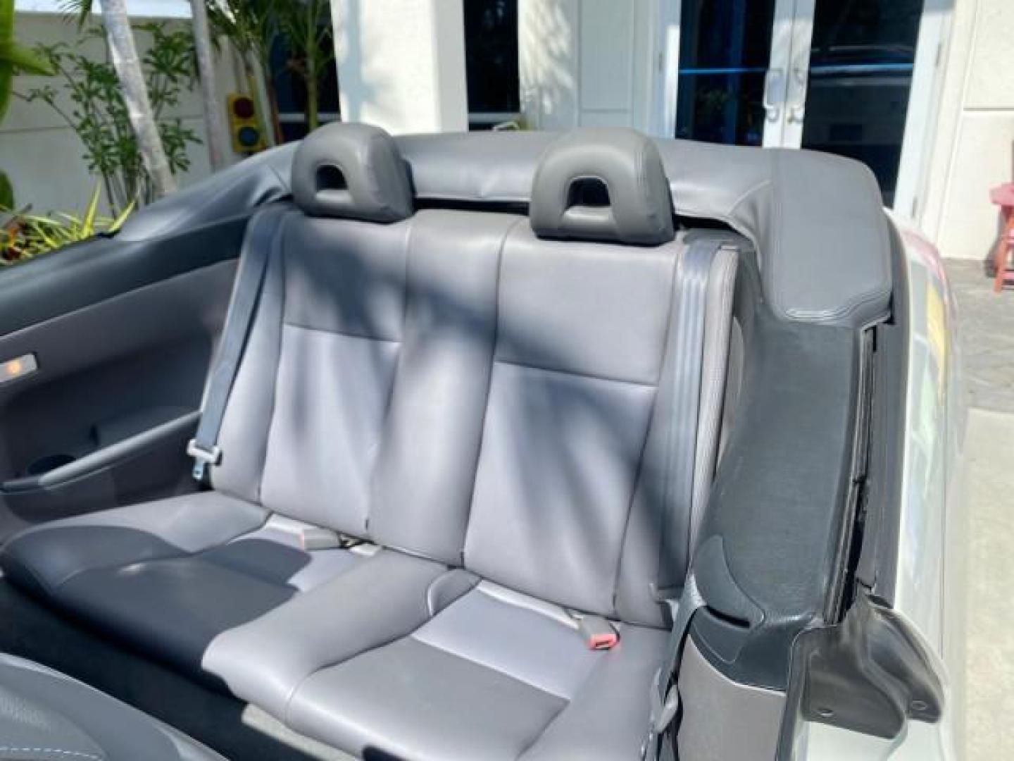 2008 Blizzard White Pearl /Dark Gray Toyota Camry Solara SE CONVERTIBLE LOW MILES 74,665 (4T1FA38PX8U) with an 3.3L DOHC SMPI VVT-i 24-Valve V6 Engine engine, Automatic transmission, located at 4701 North Dixie Hwy, Pompano Beach, FL, 33064, (954) 422-2889, 26.240938, -80.123474 - OUR WEBPAGE FLORIDACARS1.COM HAS OVER 100 PHOTOS AND FREE CARFAX LINK 2008 Toyota Camry Solara SE V6 Convertible 3.3L V6 F DOHC 24V Gasoline 29 MPG Front Wheel Drive Features ABS Brakes Air Conditioning Alloy Wheels AM/FM Stereo Automatic Transmission Auxiliary Audio Input CD Audio Cruise Control Le- Photo#71