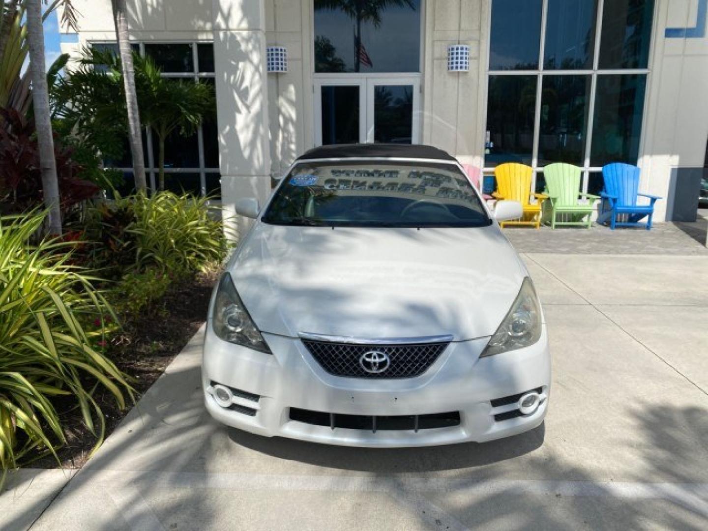 2008 Blizzard White Pearl /Dark Gray Toyota Camry Solara SE CONVERTIBLE LOW MILES 74,665 (4T1FA38PX8U) with an 3.3L DOHC SMPI VVT-i 24-Valve V6 Engine engine, Automatic transmission, located at 4701 North Dixie Hwy, Pompano Beach, FL, 33064, (954) 422-2889, 26.240938, -80.123474 - OUR WEBPAGE FLORIDACARS1.COM HAS OVER 100 PHOTOS AND FREE CARFAX LINK 2008 Toyota Camry Solara SE V6 Convertible 3.3L V6 F DOHC 24V Gasoline 29 MPG Front Wheel Drive Features ABS Brakes Air Conditioning Alloy Wheels AM/FM Stereo Automatic Transmission Auxiliary Audio Input CD Audio Cruise Control Le- Photo#26