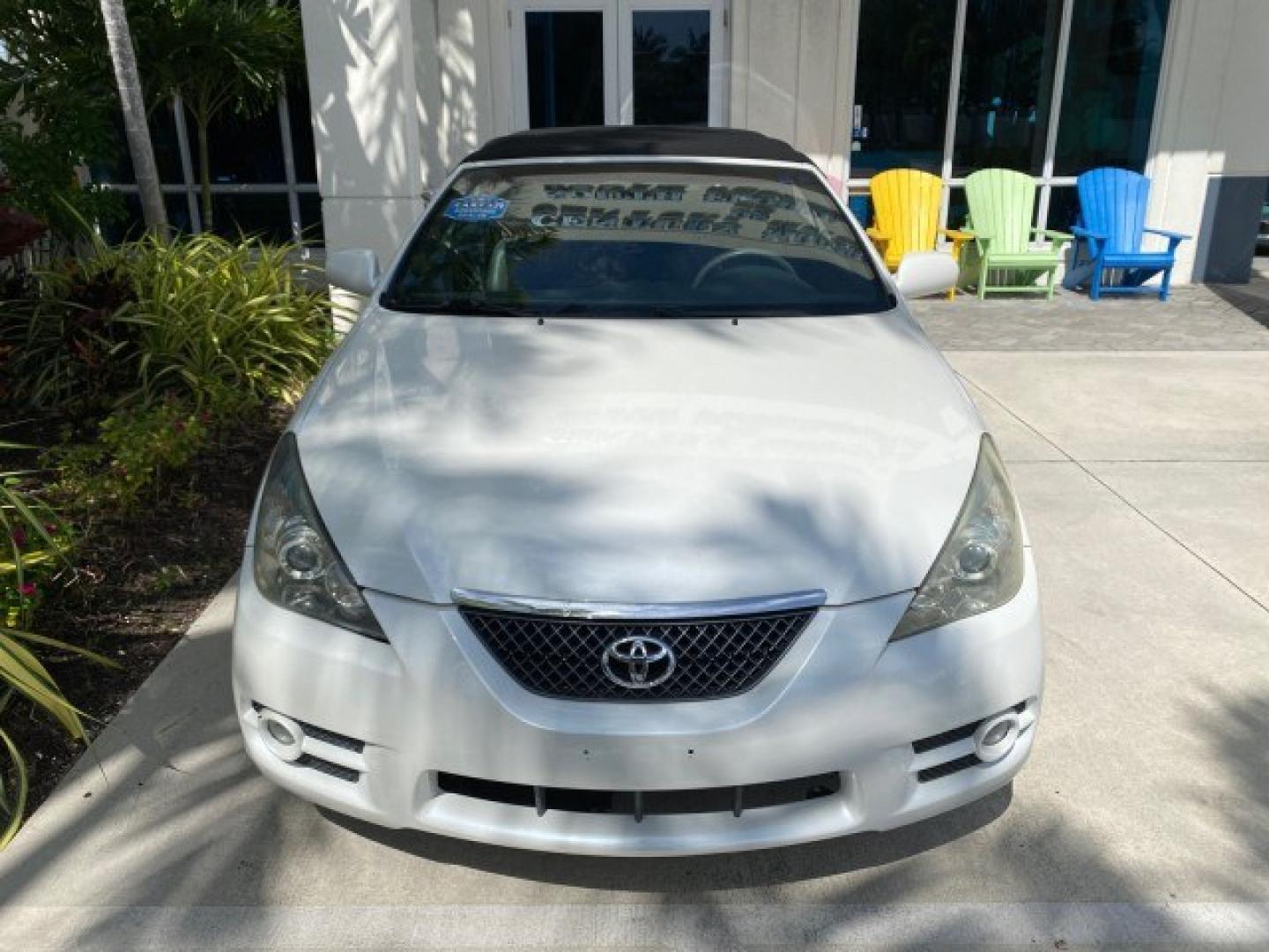 2008 Blizzard White Pearl /Dark Gray Toyota Camry Solara SE CONVERTIBLE LOW MILES 74,665 (4T1FA38PX8U) with an 3.3L DOHC SMPI VVT-i 24-Valve V6 Engine engine, Automatic transmission, located at 4701 North Dixie Hwy, Pompano Beach, FL, 33064, (954) 422-2889, 26.240938, -80.123474 - OUR WEBPAGE FLORIDACARS1.COM HAS OVER 100 PHOTOS AND FREE CARFAX LINK 2008 Toyota Camry Solara SE V6 Convertible 3.3L V6 F DOHC 24V Gasoline 29 MPG Front Wheel Drive Features ABS Brakes Air Conditioning Alloy Wheels AM/FM Stereo Automatic Transmission Auxiliary Audio Input CD Audio Cruise Control Le- Photo#28