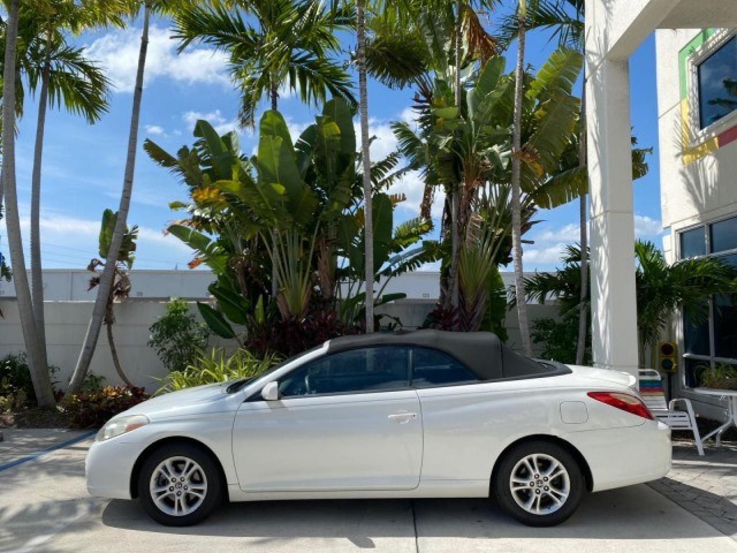 2008 Blizzard White Pearl /Dark Gray Toyota Camry Solara SE CONVERTIBLE LOW MILES 74,665 (4T1FA38PX8U) with an 3.3L DOHC SMPI VVT-i 24-Valve V6 Engine engine, Automatic transmission, located at 4701 North Dixie Hwy, Pompano Beach, FL, 33064, (954) 422-2889, 26.240938, -80.123474 - OUR WEBPAGE FLORIDACARS1.COM HAS OVER 100 PHOTOS AND FREE CARFAX LINK 2008 Toyota Camry Solara SE V6 Convertible 3.3L V6 F DOHC 24V Gasoline 29 MPG Front Wheel Drive Features ABS Brakes Air Conditioning Alloy Wheels AM/FM Stereo Automatic Transmission Auxiliary Audio Input CD Audio Cruise Control Le- Photo#34