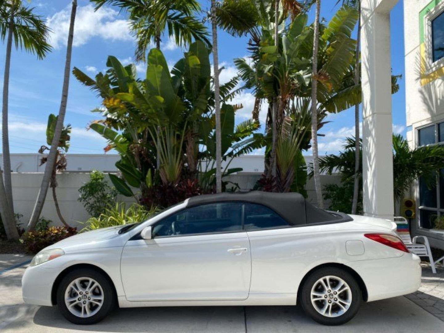 2008 Blizzard White Pearl /Dark Gray Toyota Camry Solara SE CONVERTIBLE LOW MILES 74,665 (4T1FA38PX8U) with an 3.3L DOHC SMPI VVT-i 24-Valve V6 Engine engine, Automatic transmission, located at 4701 North Dixie Hwy, Pompano Beach, FL, 33064, (954) 422-2889, 26.240938, -80.123474 - OUR WEBPAGE FLORIDACARS1.COM HAS OVER 100 PHOTOS AND FREE CARFAX LINK 2008 Toyota Camry Solara SE V6 Convertible 3.3L V6 F DOHC 24V Gasoline 29 MPG Front Wheel Drive Features ABS Brakes Air Conditioning Alloy Wheels AM/FM Stereo Automatic Transmission Auxiliary Audio Input CD Audio Cruise Control Le- Photo#36