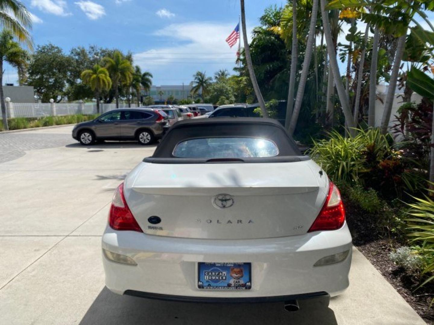 2008 Blizzard White Pearl /Dark Gray Toyota Camry Solara SE CONVERTIBLE LOW MILES 74,665 (4T1FA38PX8U) with an 3.3L DOHC SMPI VVT-i 24-Valve V6 Engine engine, Automatic transmission, located at 4701 North Dixie Hwy, Pompano Beach, FL, 33064, (954) 422-2889, 26.240938, -80.123474 - OUR WEBPAGE FLORIDACARS1.COM HAS OVER 100 PHOTOS AND FREE CARFAX LINK 2008 Toyota Camry Solara SE V6 Convertible 3.3L V6 F DOHC 24V Gasoline 29 MPG Front Wheel Drive Features ABS Brakes Air Conditioning Alloy Wheels AM/FM Stereo Automatic Transmission Auxiliary Audio Input CD Audio Cruise Control Le- Photo#42