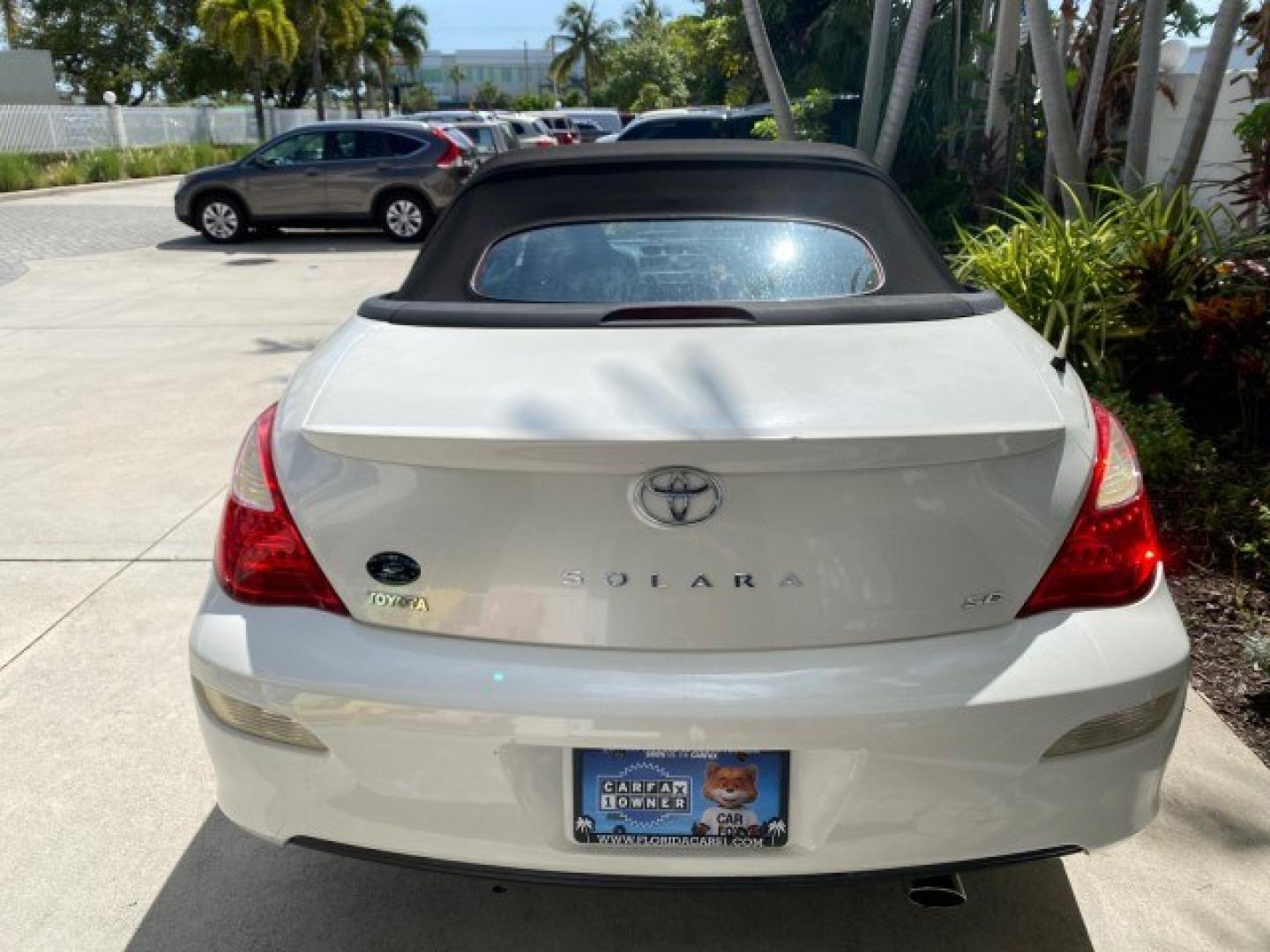 2008 Blizzard White Pearl /Dark Gray Toyota Camry Solara SE CONVERTIBLE LOW MILES 74,665 (4T1FA38PX8U) with an 3.3L DOHC SMPI VVT-i 24-Valve V6 Engine engine, Automatic transmission, located at 4701 North Dixie Hwy, Pompano Beach, FL, 33064, (954) 422-2889, 26.240938, -80.123474 - OUR WEBPAGE FLORIDACARS1.COM HAS OVER 100 PHOTOS AND FREE CARFAX LINK 2008 Toyota Camry Solara SE V6 Convertible 3.3L V6 F DOHC 24V Gasoline 29 MPG Front Wheel Drive Features ABS Brakes Air Conditioning Alloy Wheels AM/FM Stereo Automatic Transmission Auxiliary Audio Input CD Audio Cruise Control Le- Photo#44