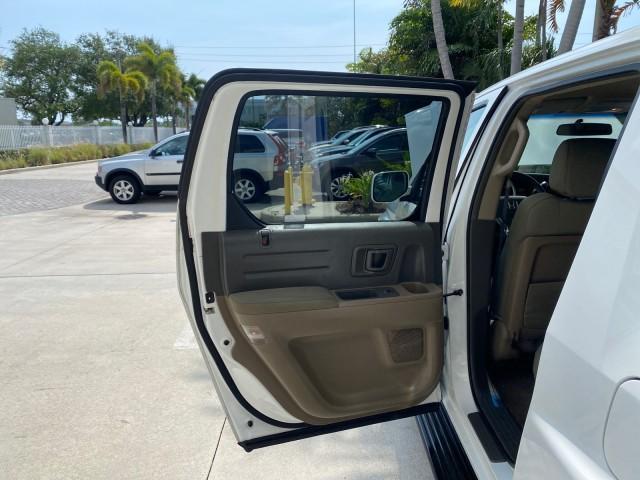 2008 Taffeta White /Beige Honda Ridgeline RTS 4WD LOW MILES 73,653 1 OWNER (2HJYK16428H) with an 3.5L SOHC MPFI 24-Valve VTEC V6 Engine engine, Automatic transmission, located at 4701 North Dixie Hwy, Pompano Beach, FL, 33064, (954) 422-2889, 26.240938, -80.123474 - OUR WEBPAGE FLORIDACARS1.COM HAS OVER 100 PHOTOS AND FREE CARFAX LINK 2008 Honda Ridgeline RTS 1 OWNER Crew Pickup 3.5L V6 F SOHC 24V Gasoline 21 MPG Front Wheel Drive w/ 4X4 Features 4WD/AWD ABS Brakes Air Conditioning Alloy Wheels AM/FM Stereo Automatic Transmission CD Audio Cloth Seats Cruise Con - Photo#13
