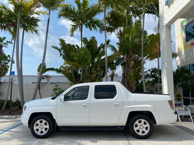 2008 Taffeta White /Beige Honda Ridgeline RTS 4WD LOW MILES 73,653 1 OWNER (2HJYK16428H) with an 3.5L SOHC MPFI 24-Valve VTEC V6 Engine engine, Automatic transmission, located at 4701 North Dixie Hwy, Pompano Beach, FL, 33064, (954) 422-2889, 26.240938, -80.123474 - OUR WEBPAGE FLORIDACARS1.COM HAS OVER 100 PHOTOS AND FREE CARFAX LINK 2008 Honda Ridgeline RTS 1 OWNER Crew Pickup 3.5L V6 F SOHC 24V Gasoline 21 MPG Front Wheel Drive w/ 4X4 Features 4WD/AWD ABS Brakes Air Conditioning Alloy Wheels AM/FM Stereo Automatic Transmission CD Audio Cloth Seats Cruise Con - Photo#30