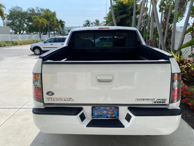 2008 Taffeta White /Beige Honda Ridgeline RTS 4WD LOW MILES 73,653 1 OWNER (2HJYK16428H) with an 3.5L SOHC MPFI 24-Valve VTEC V6 Engine engine, Automatic transmission, located at 4701 North Dixie Hwy, Pompano Beach, FL, 33064, (954) 422-2889, 26.240938, -80.123474 - OUR WEBPAGE FLORIDACARS1.COM HAS OVER 100 PHOTOS AND FREE CARFAX LINK 2008 Honda Ridgeline RTS 1 OWNER Crew Pickup 3.5L V6 F SOHC 24V Gasoline 21 MPG Front Wheel Drive w/ 4X4 Features 4WD/AWD ABS Brakes Air Conditioning Alloy Wheels AM/FM Stereo Automatic Transmission CD Audio Cloth Seats Cruise Con - Photo#35
