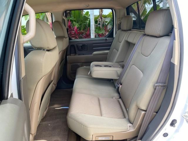 2008 Taffeta White /Beige Honda Ridgeline RTS 4WD LOW MILES 73,653 1 OWNER (2HJYK16428H) with an 3.5L SOHC MPFI 24-Valve VTEC V6 Engine engine, Automatic transmission, located at 4701 North Dixie Hwy, Pompano Beach, FL, 33064, (954) 422-2889, 26.240938, -80.123474 - OUR WEBPAGE FLORIDACARS1.COM HAS OVER 100 PHOTOS AND FREE CARFAX LINK 2008 Honda Ridgeline RTS 1 OWNER Crew Pickup 3.5L V6 F SOHC 24V Gasoline 21 MPG Front Wheel Drive w/ 4X4 Features 4WD/AWD ABS Brakes Air Conditioning Alloy Wheels AM/FM Stereo Automatic Transmission CD Audio Cloth Seats Cruise Con - Photo#75