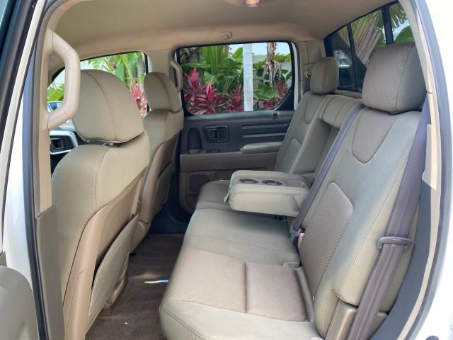 2008 Taffeta White /Beige Honda Ridgeline RTS 4WD LOW MILES 73,653 1 OWNER (2HJYK16428H) with an 3.5L SOHC MPFI 24-Valve VTEC V6 Engine engine, Automatic transmission, located at 4701 North Dixie Hwy, Pompano Beach, FL, 33064, (954) 422-2889, 26.240938, -80.123474 - OUR WEBPAGE FLORIDACARS1.COM HAS OVER 100 PHOTOS AND FREE CARFAX LINK 2008 Honda Ridgeline RTS 1 OWNER Crew Pickup 3.5L V6 F SOHC 24V Gasoline 21 MPG Front Wheel Drive w/ 4X4 Features 4WD/AWD ABS Brakes Air Conditioning Alloy Wheels AM/FM Stereo Automatic Transmission CD Audio Cloth Seats Cruise Con - Photo#76