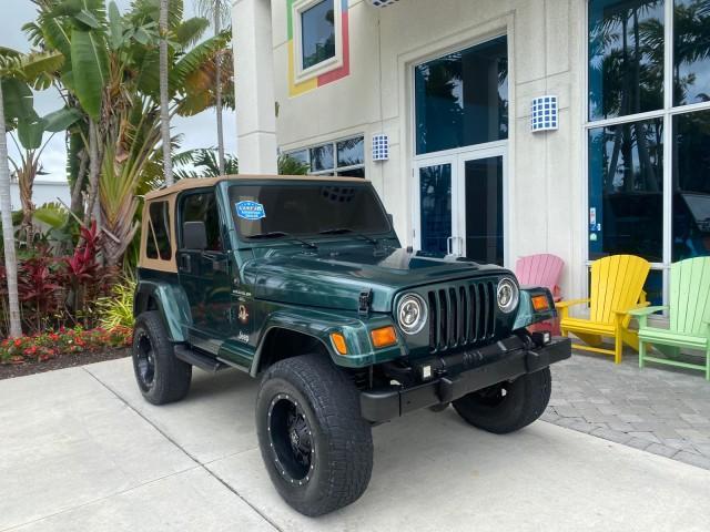 1999 Forest Green Pearl /Camel/Dark Green Jeep Wrangler Sahara AUYO AC 6 CYL LOW MILES 47,009 (1J4FY49S0XP) with an 4.0L SMPI I6 Power Tech Engine engine, Automatic transmission, located at 4701 North Dixie Hwy, Pompano Beach, FL, 33064, (954) 422-2889, 26.240938, -80.123474 - OUR WEBPAGE FLORIDACARS1.COM HAS OVER 100 PHOTOS AND FREE CARFAX LINK 1999 Jeep Wrangler Sahara Utility (Blazer, Jimmy, Scout, etc.) 4.0L I6 F Gasoline 20 MPG Rear Wheel Drive w/ 4X4 Features 4WD/AWD ABS Brakes Air Conditioning Alloy Wheels AM/FM Stereo Automatic Transmission Cassette Player CD Audi - Photo#1