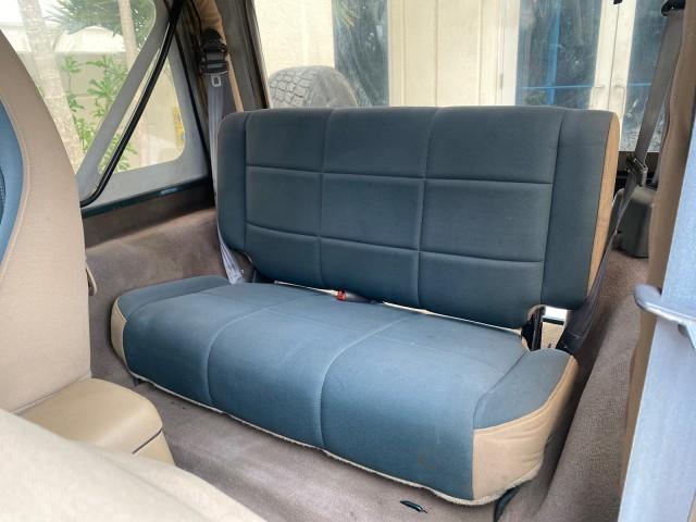 1999 Forest Green Pearl /Camel/Dark Green Jeep Wrangler Sahara AUYO AC 6 CYL LOW MILES 47,009 (1J4FY49S0XP) with an 4.0L SMPI I6 Power Tech Engine engine, Automatic transmission, located at 4701 North Dixie Hwy, Pompano Beach, FL, 33064, (954) 422-2889, 26.240938, -80.123474 - OUR WEBPAGE FLORIDACARS1.COM HAS OVER 100 PHOTOS AND FREE CARFAX LINK 1999 Jeep Wrangler Sahara Utility (Blazer, Jimmy, Scout, etc.) 4.0L I6 F Gasoline 20 MPG Rear Wheel Drive w/ 4X4 Features 4WD/AWD ABS Brakes Air Conditioning Alloy Wheels AM/FM Stereo Automatic Transmission Cassette Player CD Audi - Photo#14