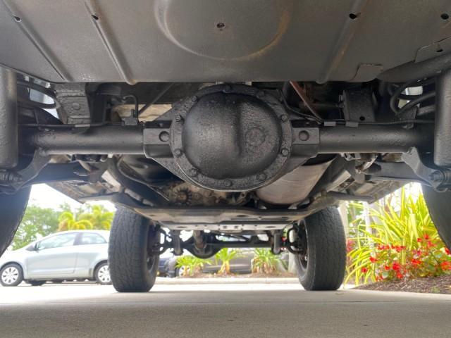 1999 Forest Green Pearl /Camel/Dark Green Jeep Wrangler Sahara AUYO AC 6 CYL LOW MILES 47,009 (1J4FY49S0XP) with an 4.0L SMPI I6 Power Tech Engine engine, Automatic transmission, located at 4701 North Dixie Hwy, Pompano Beach, FL, 33064, (954) 422-2889, 26.240938, -80.123474 - OUR WEBPAGE FLORIDACARS1.COM HAS OVER 100 PHOTOS AND FREE CARFAX LINK 1999 Jeep Wrangler Sahara Utility (Blazer, Jimmy, Scout, etc.) 4.0L I6 F Gasoline 20 MPG Rear Wheel Drive w/ 4X4 Features 4WD/AWD ABS Brakes Air Conditioning Alloy Wheels AM/FM Stereo Automatic Transmission Cassette Player CD Audi - Photo#22