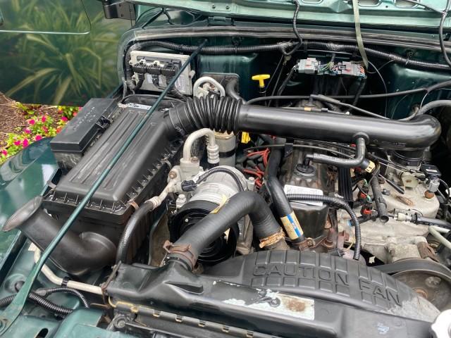 1999 Forest Green Pearl /Camel/Dark Green Jeep Wrangler Sahara AUYO AC 6 CYL LOW MILES 47,009 (1J4FY49S0XP) with an 4.0L SMPI I6 Power Tech Engine engine, Automatic transmission, located at 4701 North Dixie Hwy, Pompano Beach, FL, 33064, (954) 422-2889, 26.240938, -80.123474 - OUR WEBPAGE FLORIDACARS1.COM HAS OVER 100 PHOTOS AND FREE CARFAX LINK 1999 Jeep Wrangler Sahara Utility (Blazer, Jimmy, Scout, etc.) 4.0L I6 F Gasoline 20 MPG Rear Wheel Drive w/ 4X4 Features 4WD/AWD ABS Brakes Air Conditioning Alloy Wheels AM/FM Stereo Automatic Transmission Cassette Player CD Audi - Photo#24